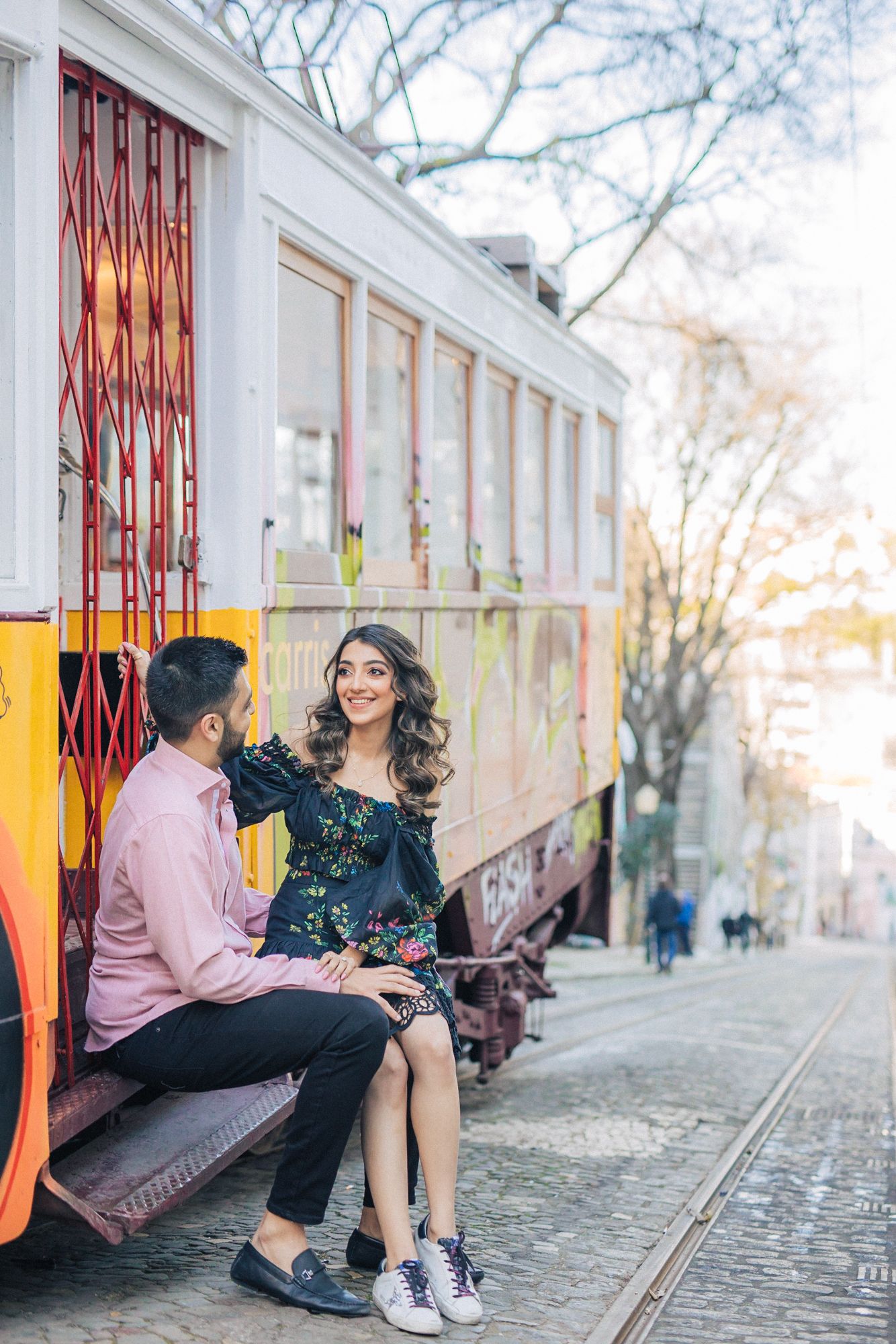Romantic engagement photoshoot of an indian couple at the historical city of Lisbon during a Destination Wedding in Portugal