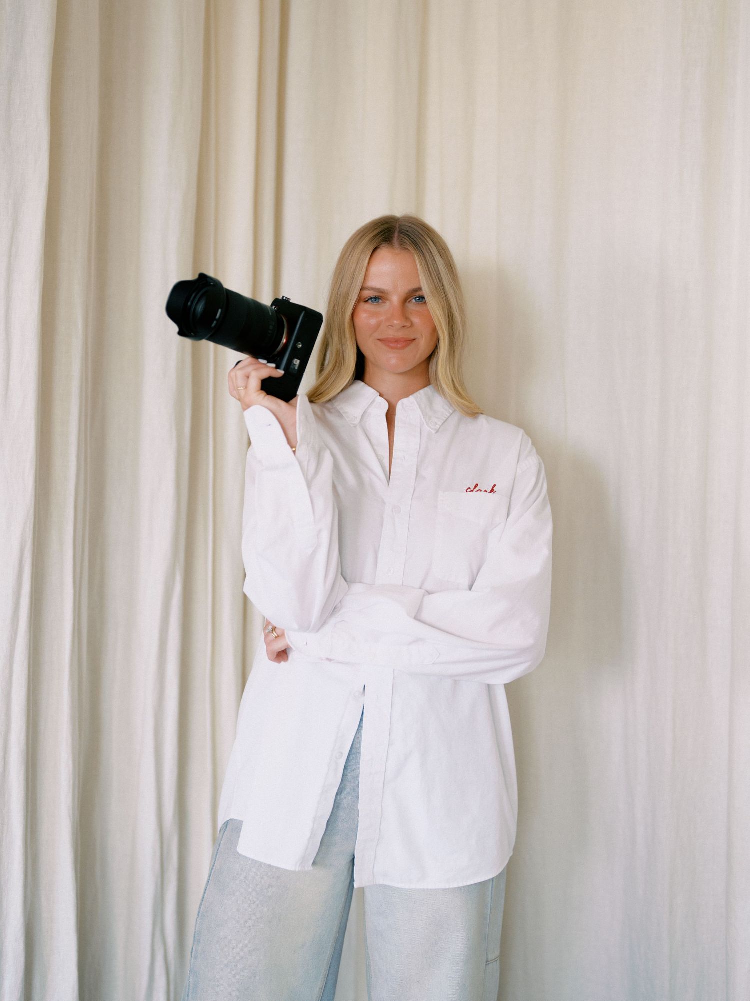Katelynn Davis Media, a wedding photographer specializing in digital and film photography.