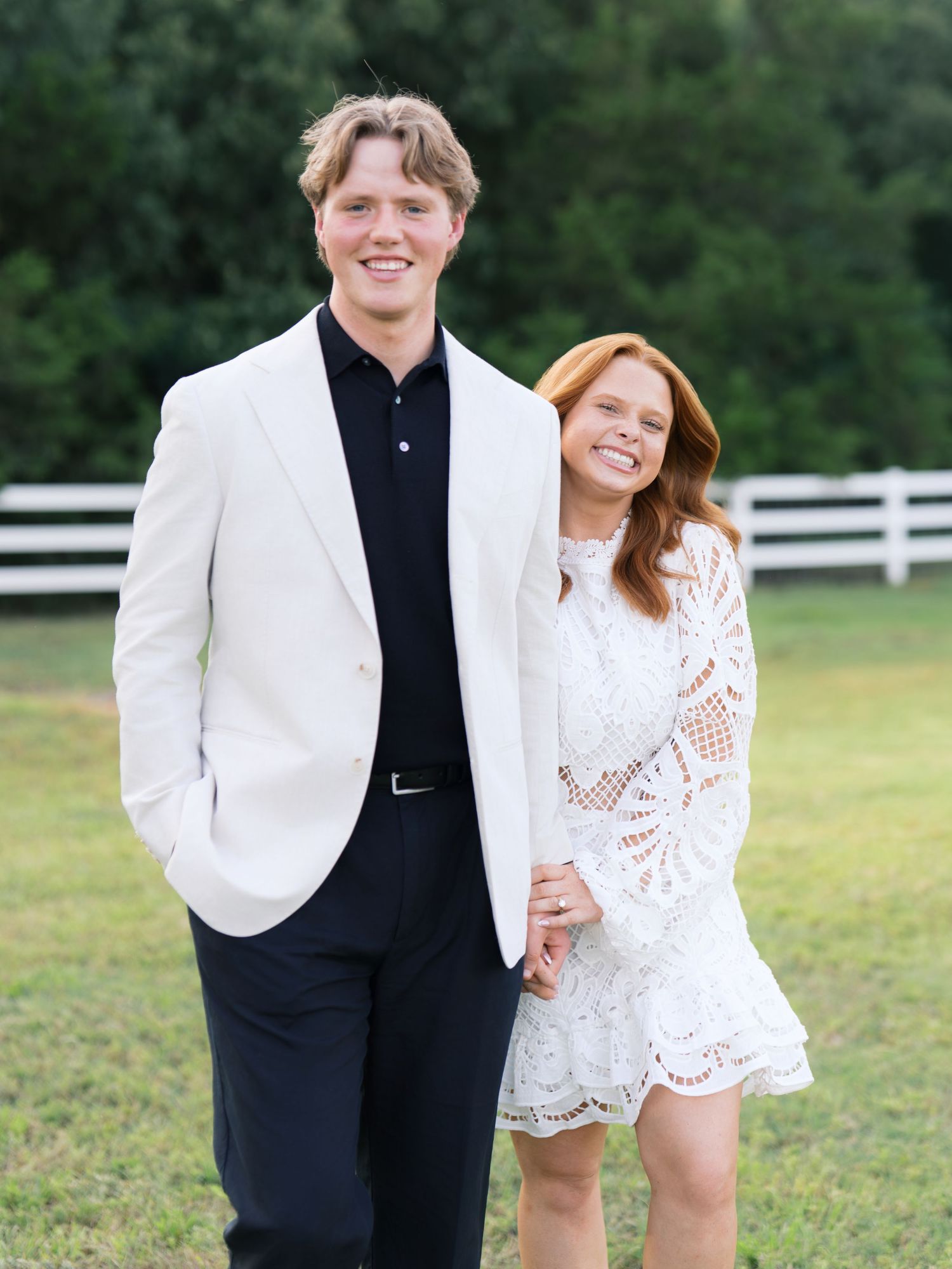 Bride and Groom smiling for Rehearsal Dinner portraits the night before their wedding at the French Farmhouse Venue.
Katelynn Davis Media