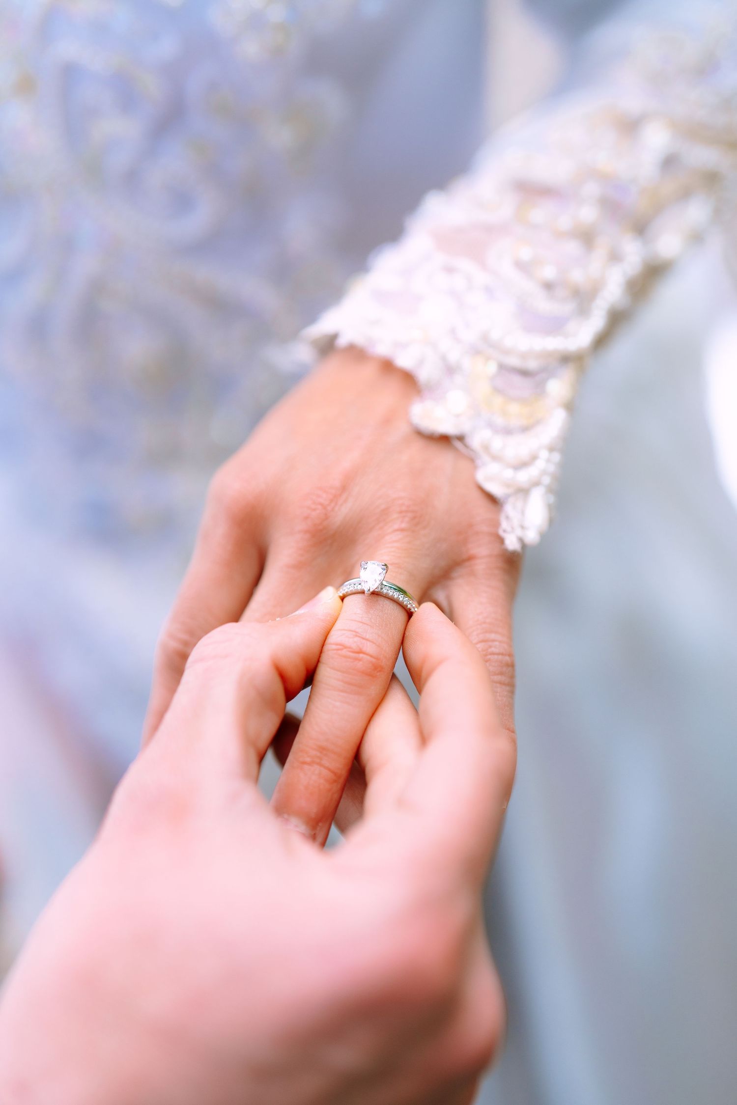 Wedding ring detail captured during an intimate Glacier National Park elopement.