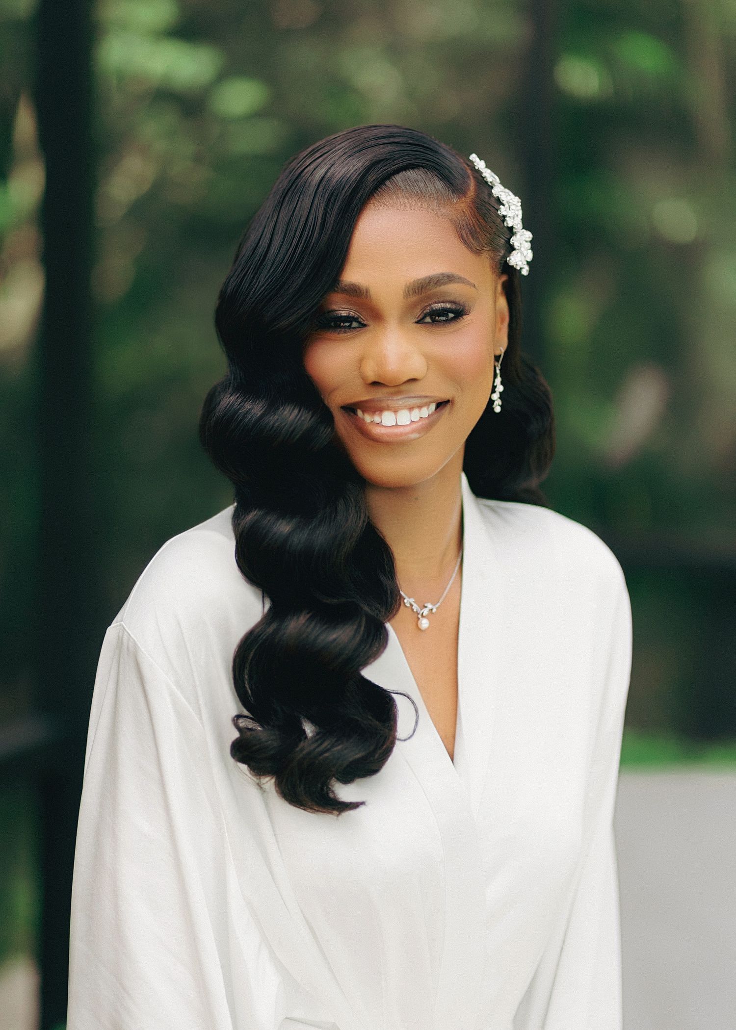 A series of glamorous bridal portraits showing a white wedding dress and elegant black hairstyle against a blurred outdoor background.