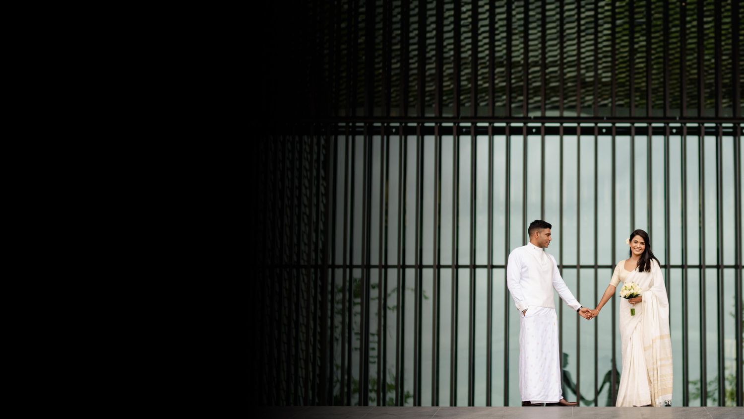 A series of six vertical panels showing figures in white clothing standing against a dark background with vertical lines.