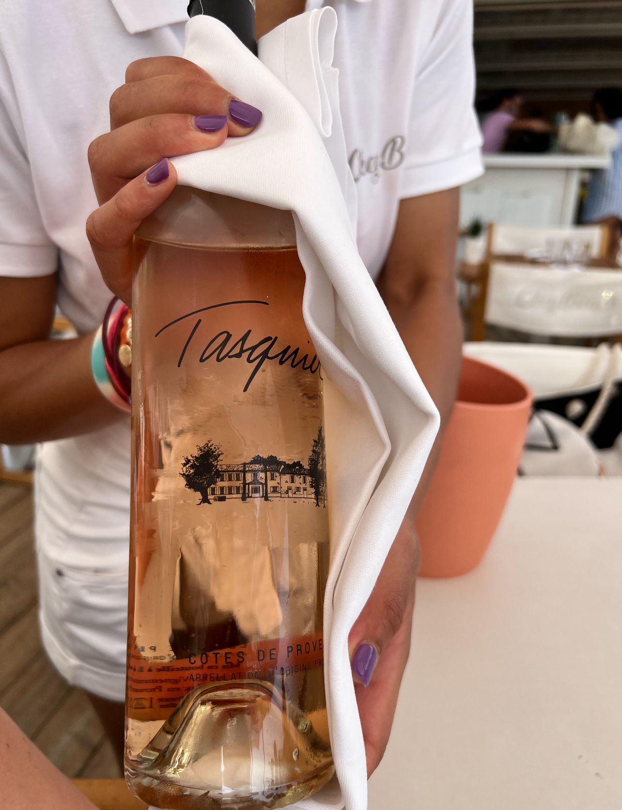 a bottle of champagne being served at an event