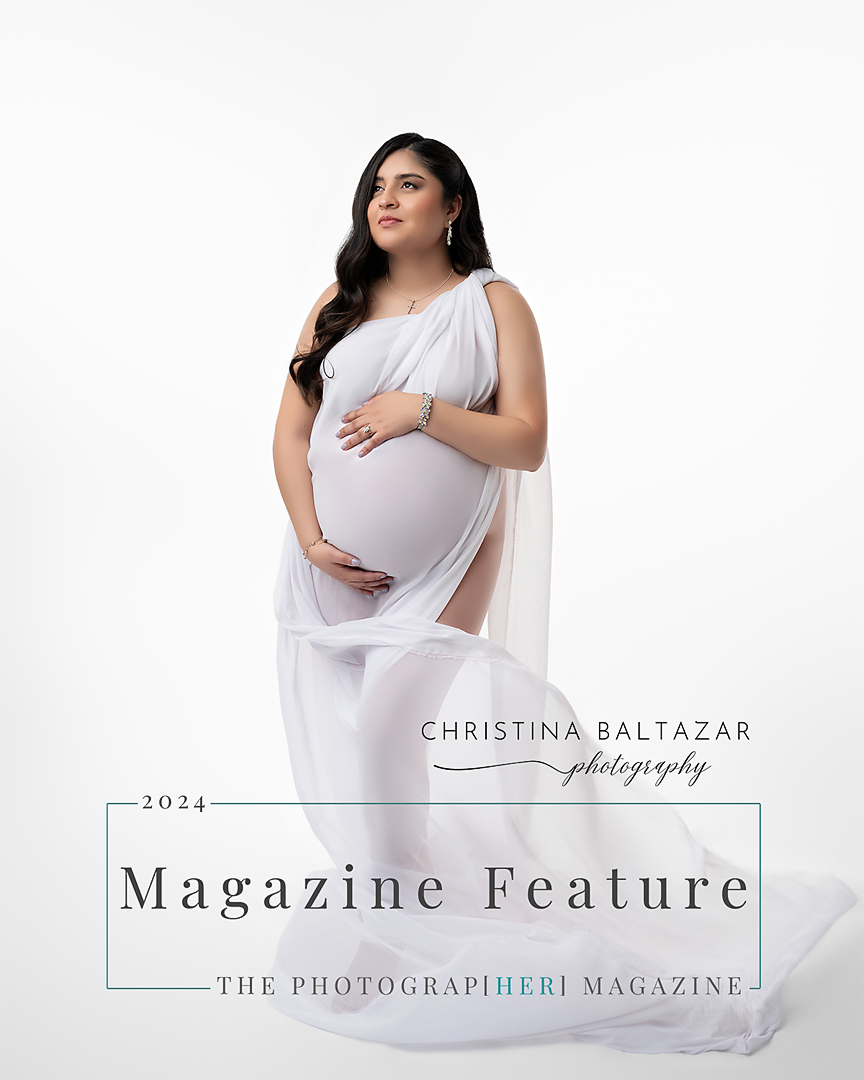 An elegant maternity photo showing a woman in white fabric against a light background for a magazine feature. Lemoore Maternity Photography