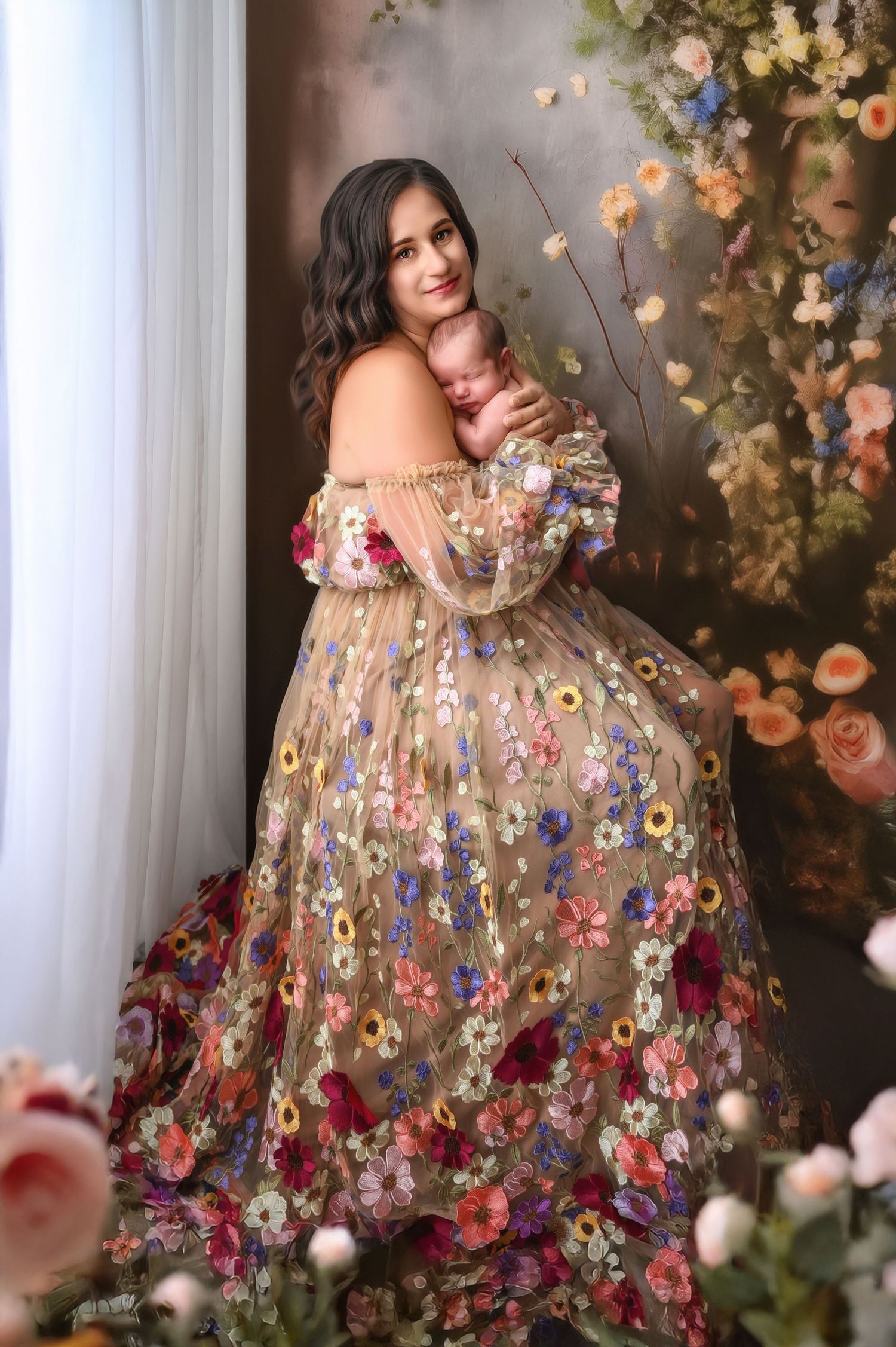 Ethereal maternity portrait with a flowing floral embellished gown among blossoms.