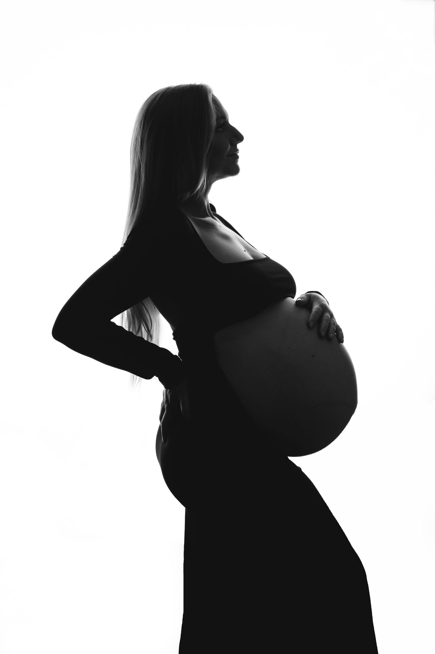 Maternity Silhouette profile against a white background. Photographed in Lemoore, CA.