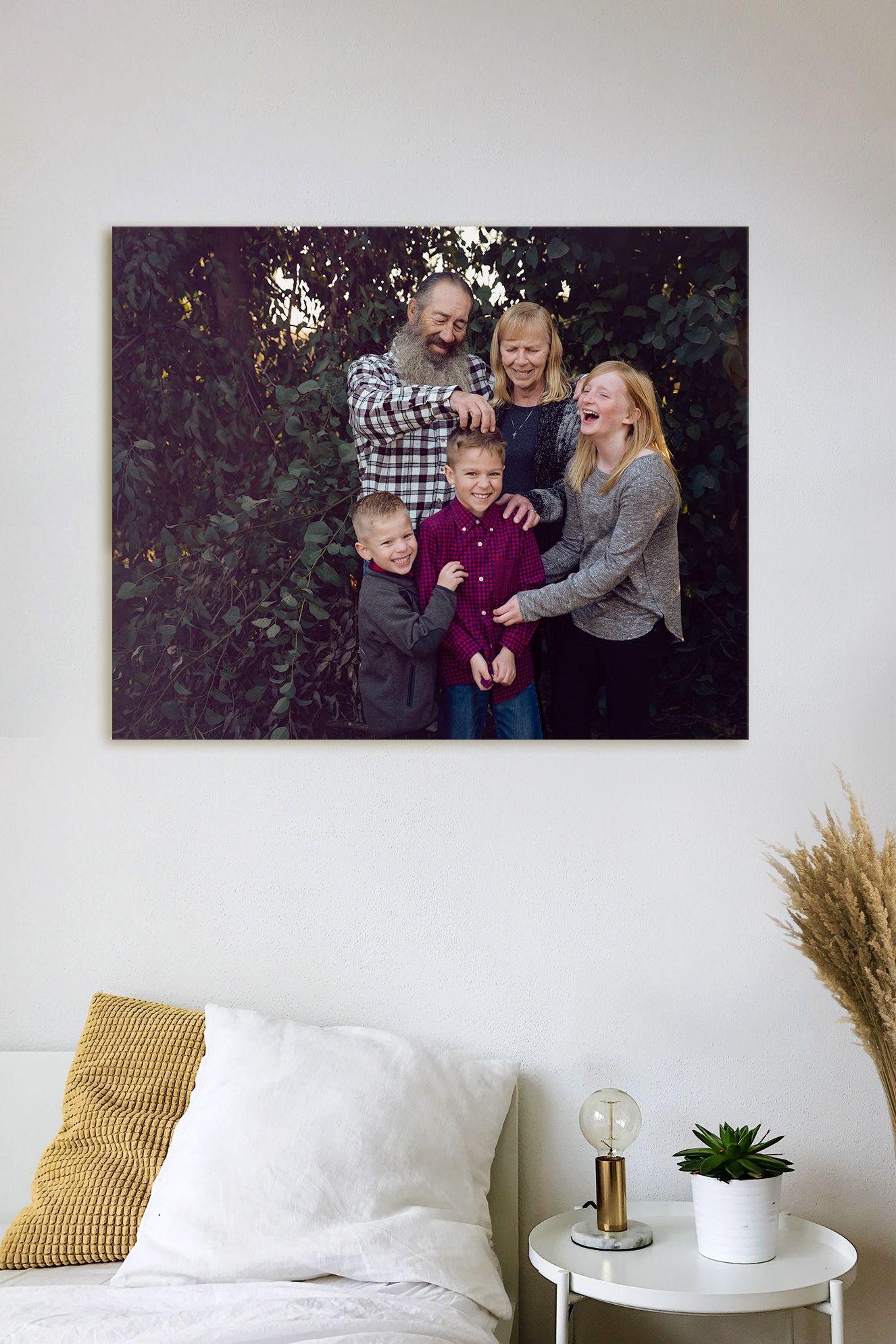 Grandparents & grandchildren laughing in family portrait hanging on wall Fresno Family Photography