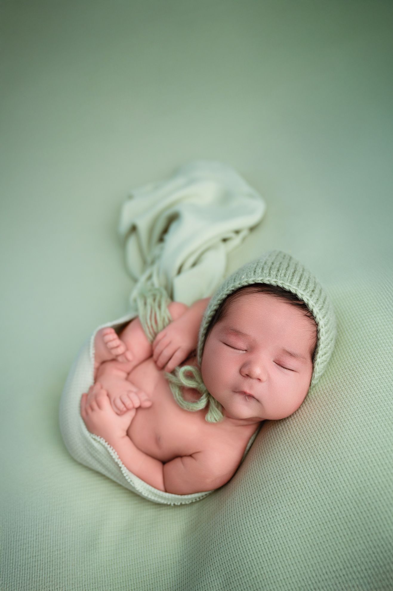 Fine art newborn portrait photographed in studio serving Fresno and Central Valley families.
