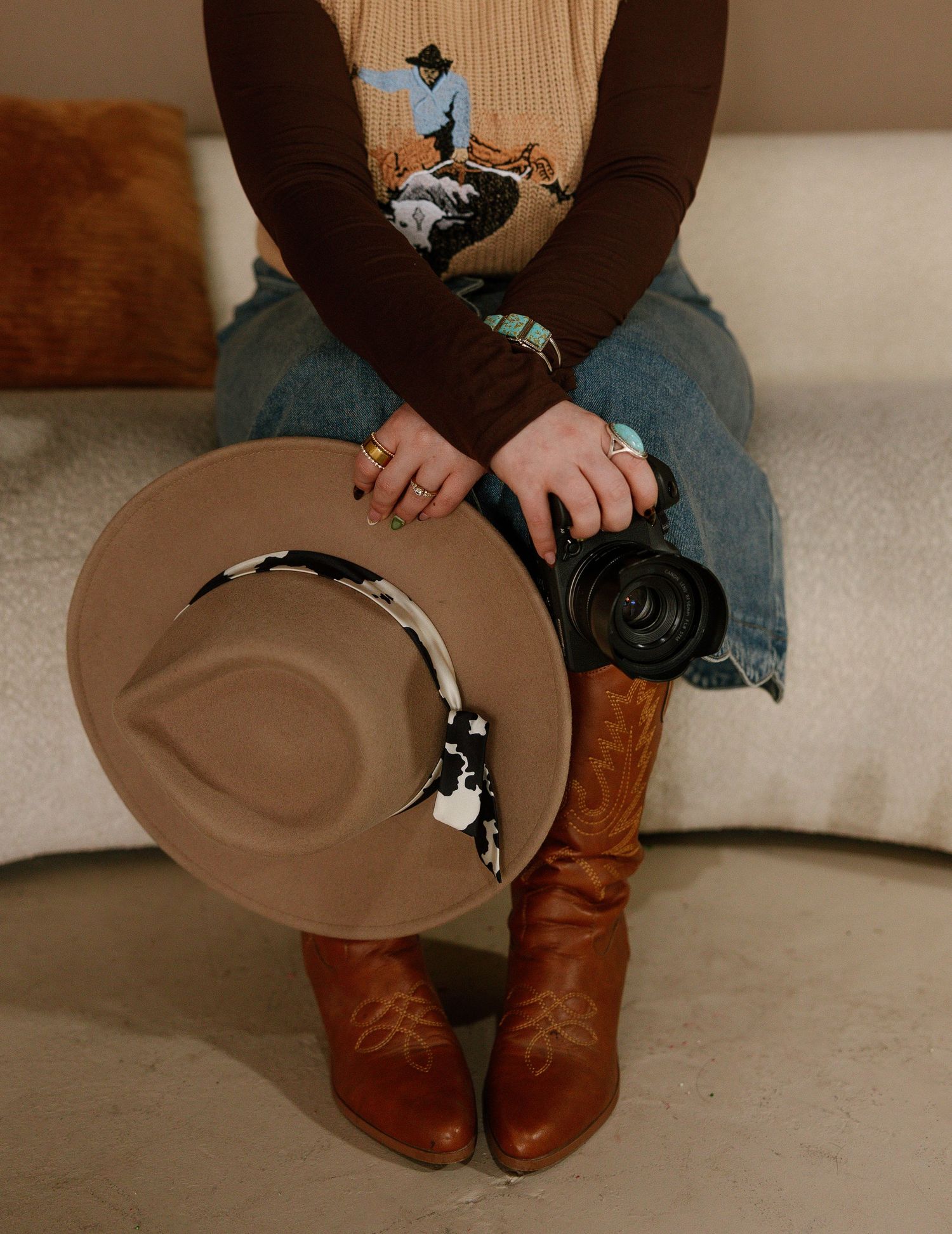 A series of images showing brown cowboy boots and a brown hat placed on a light-colored floor.