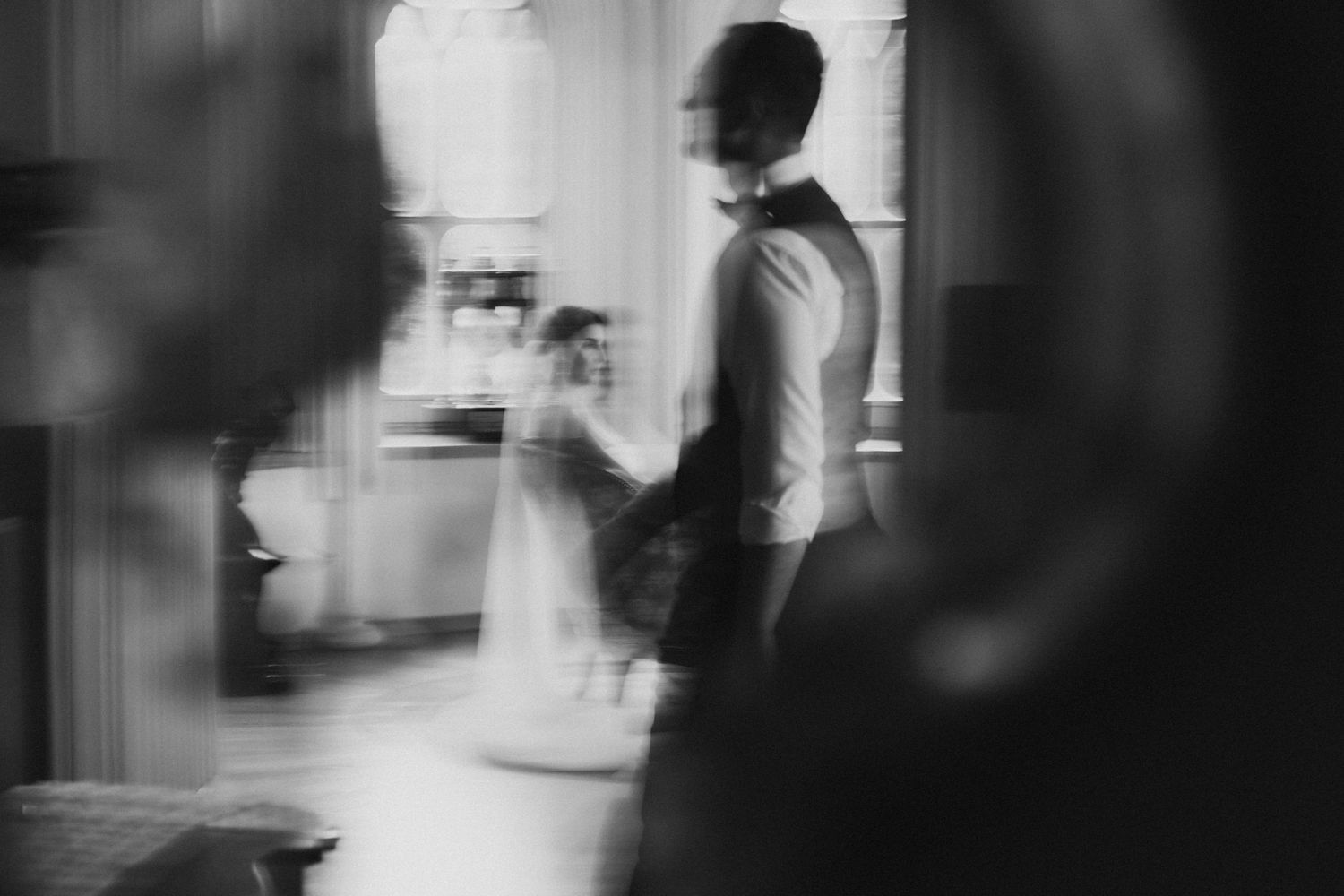 Abstract black and white motion blur photography series with artistic lighting effects.