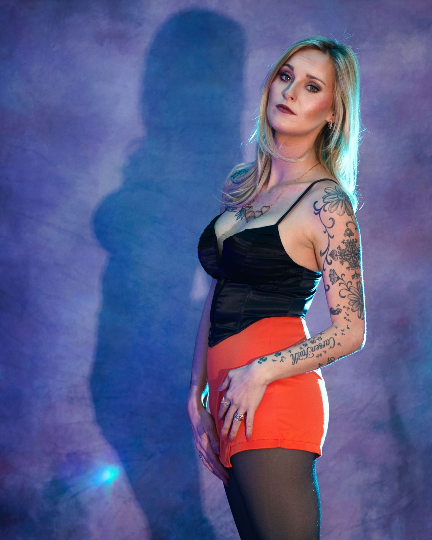 Creative beauty portrait with moody, vibrant lighting captured at Hollow Road Studio in Columbia, Missouri.