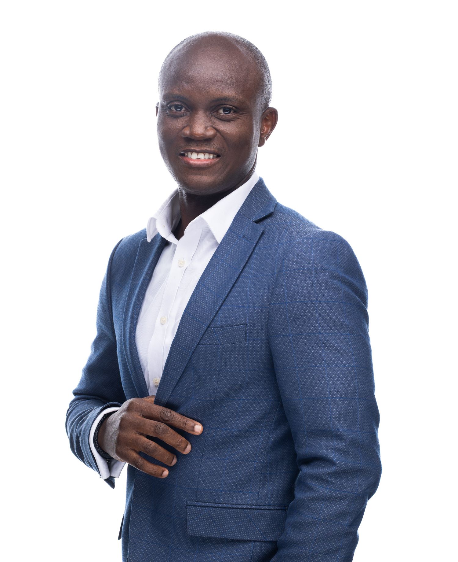 Professional wearing a navy blue suit and white dress shirt poses in four similar headshots against a light background.
