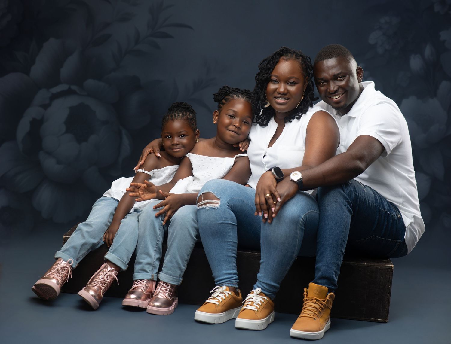 A series of connected family photos showing tender moments between parents and children sitting together in casual poses.