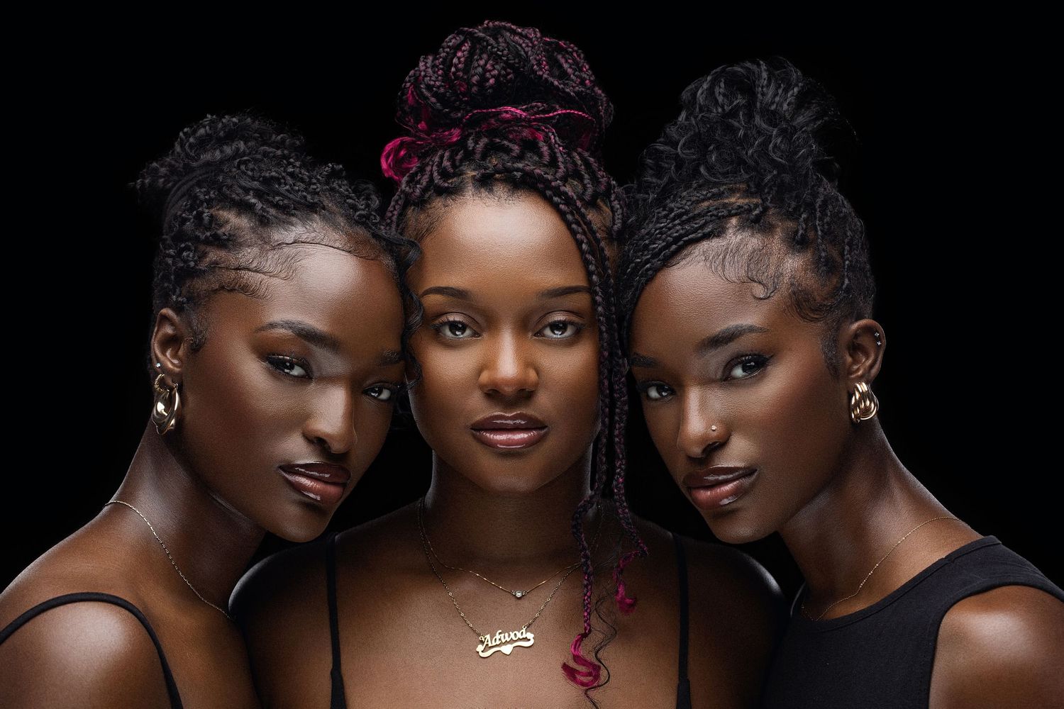 A series of artistic beauty portraits featuring models with dark skin tones against a black background.