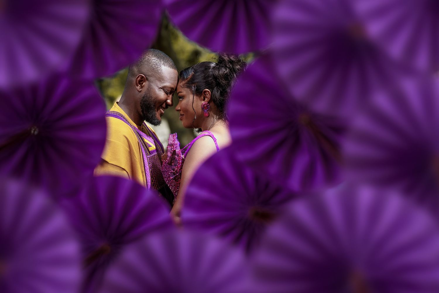 A purple spiral pattern background with a radial swirl design creates a hypnotic visual effect.