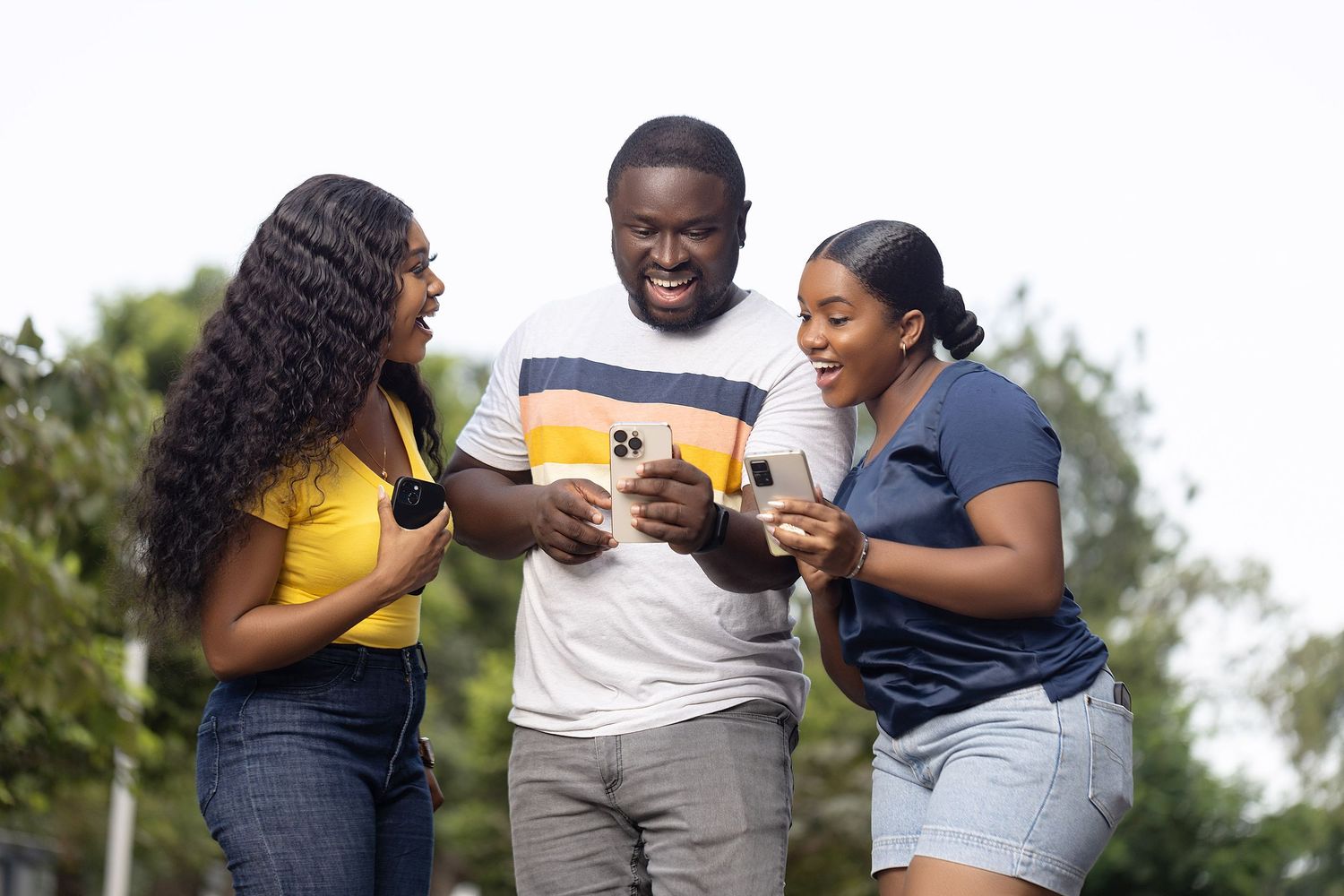 Group enjoying outdoor social gathering with casual conversation.