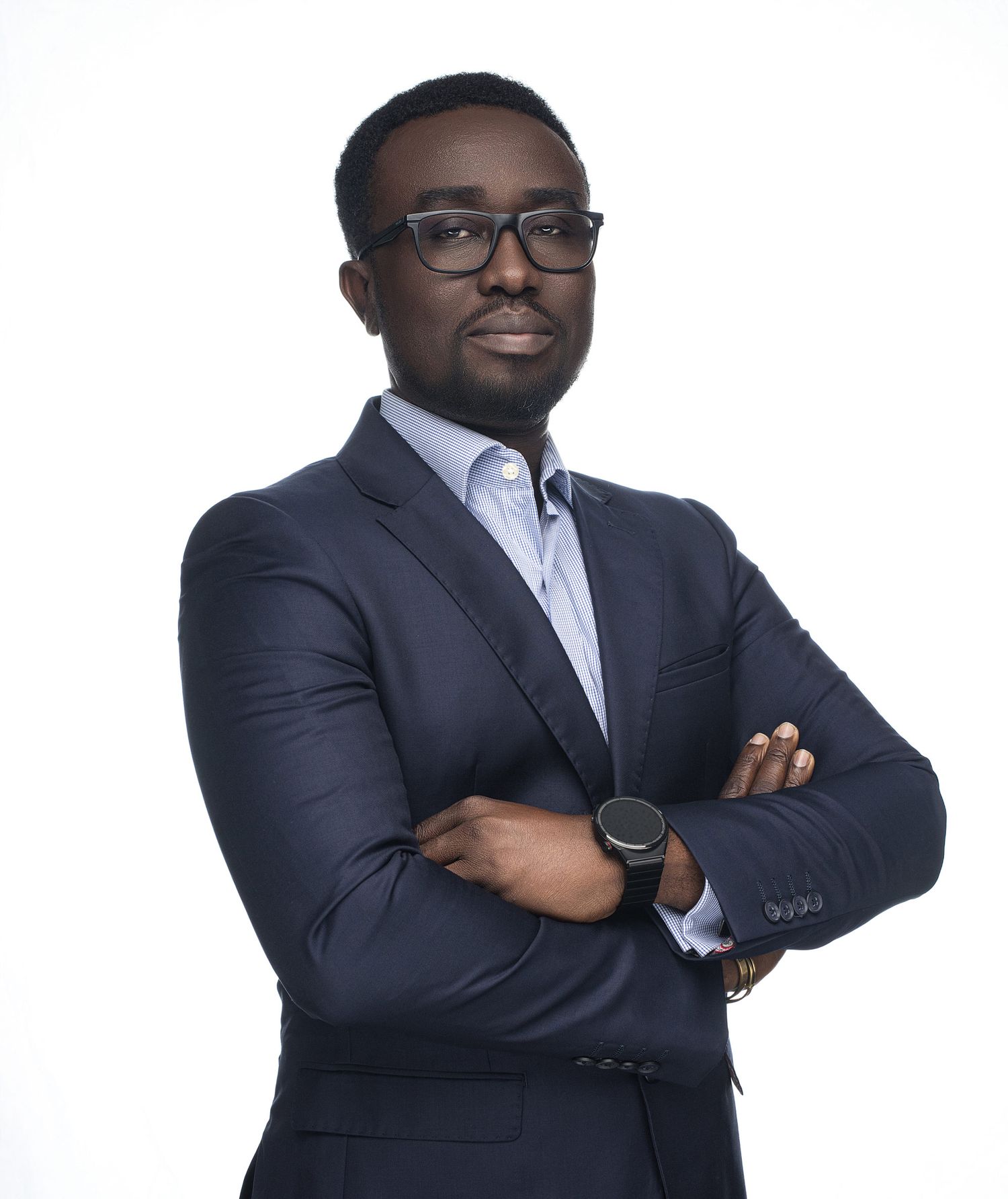 Professional in a dark suit and glasses poses in a creative quadruple exposure portrait against white background.