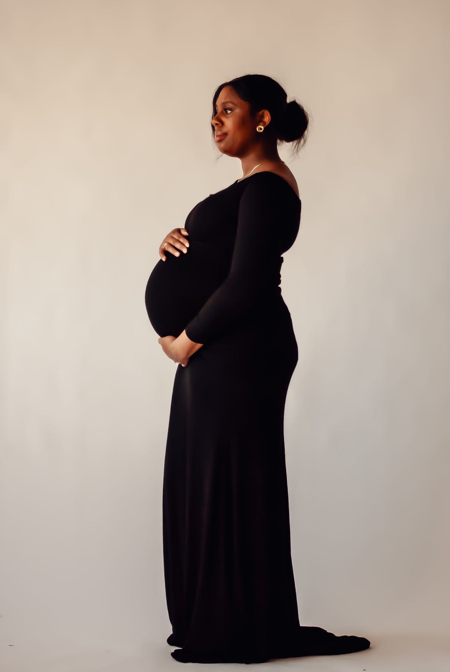 Artistic series of black and white photographs showing silhouettes of figures in black clothing against a light background.