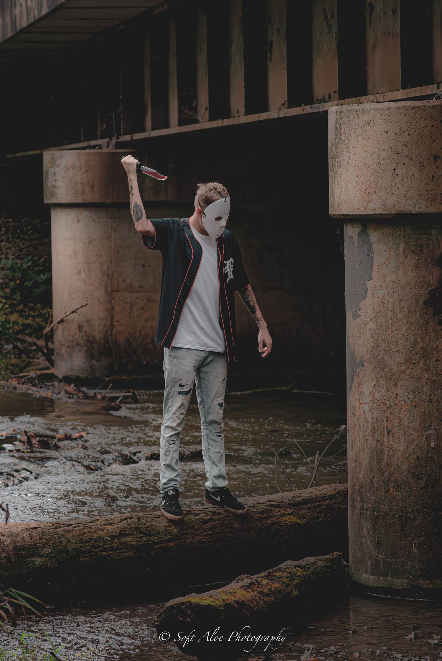 Mysterious underground photo series beneath concrete pillars in dim lighting conditions.