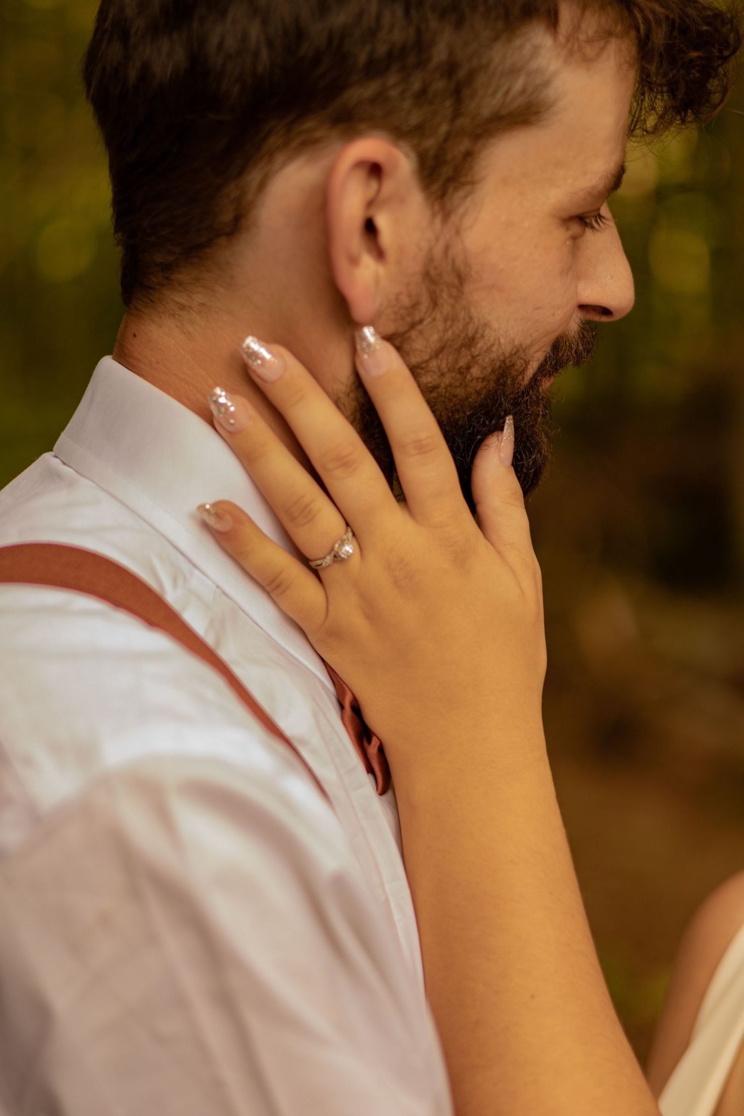 Close-up photo sequence showing hands touching a beard in soft natural lighting.