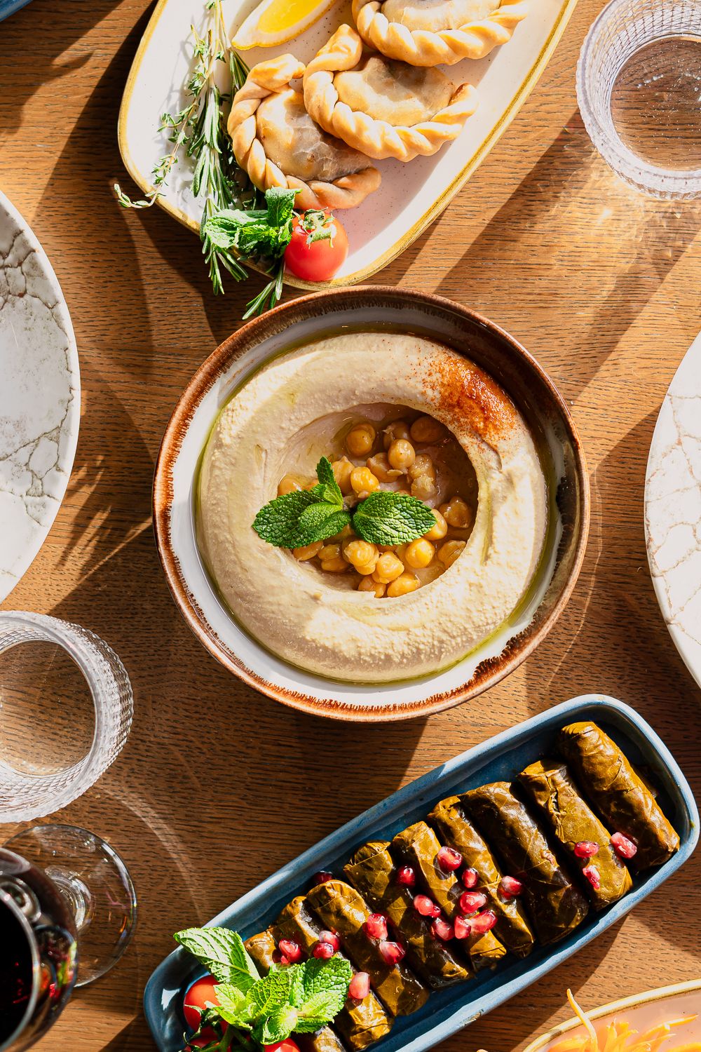 Lebanese food photography, hummus and stuffed vine leaves