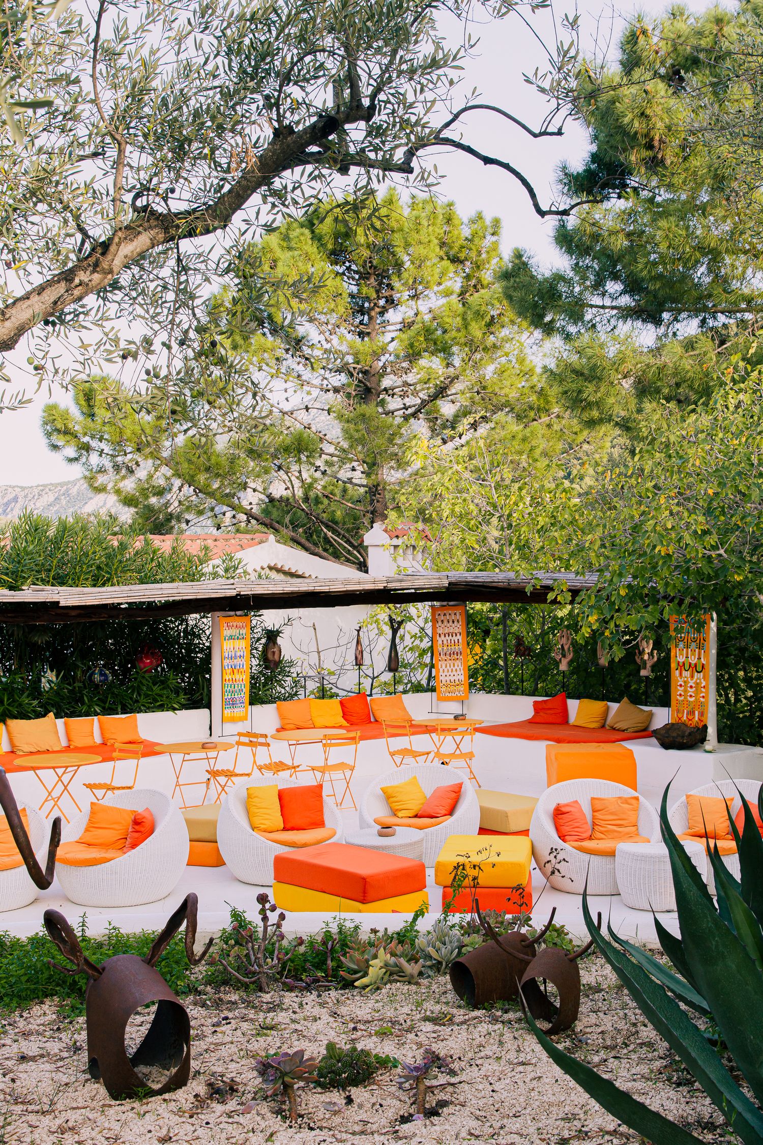Exterior and hospitality photography of the bar at Su Gologone Hotel in Sardinia