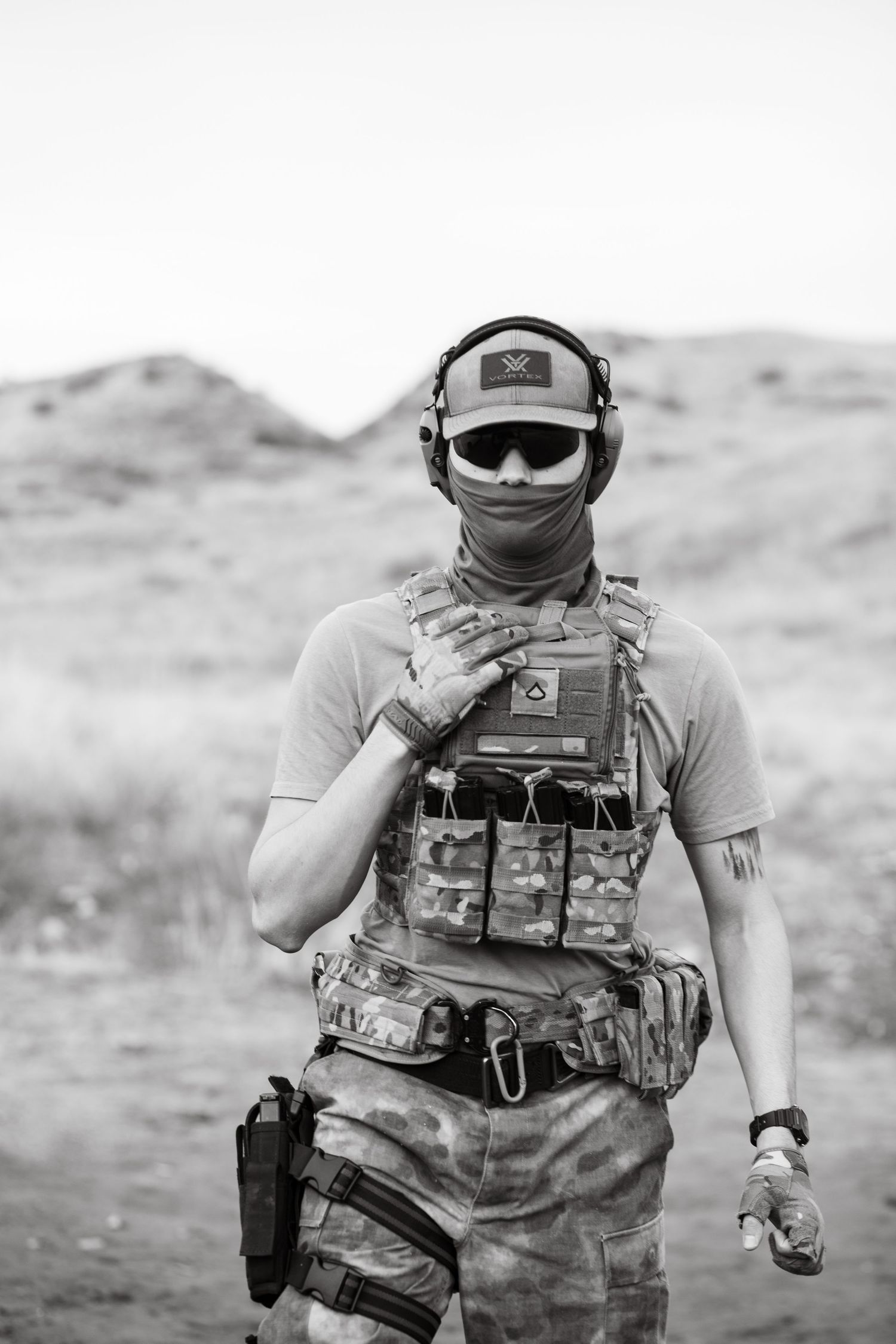 Soldier in tactical gear and camouflage pants in desert training environment located in boise Idaho