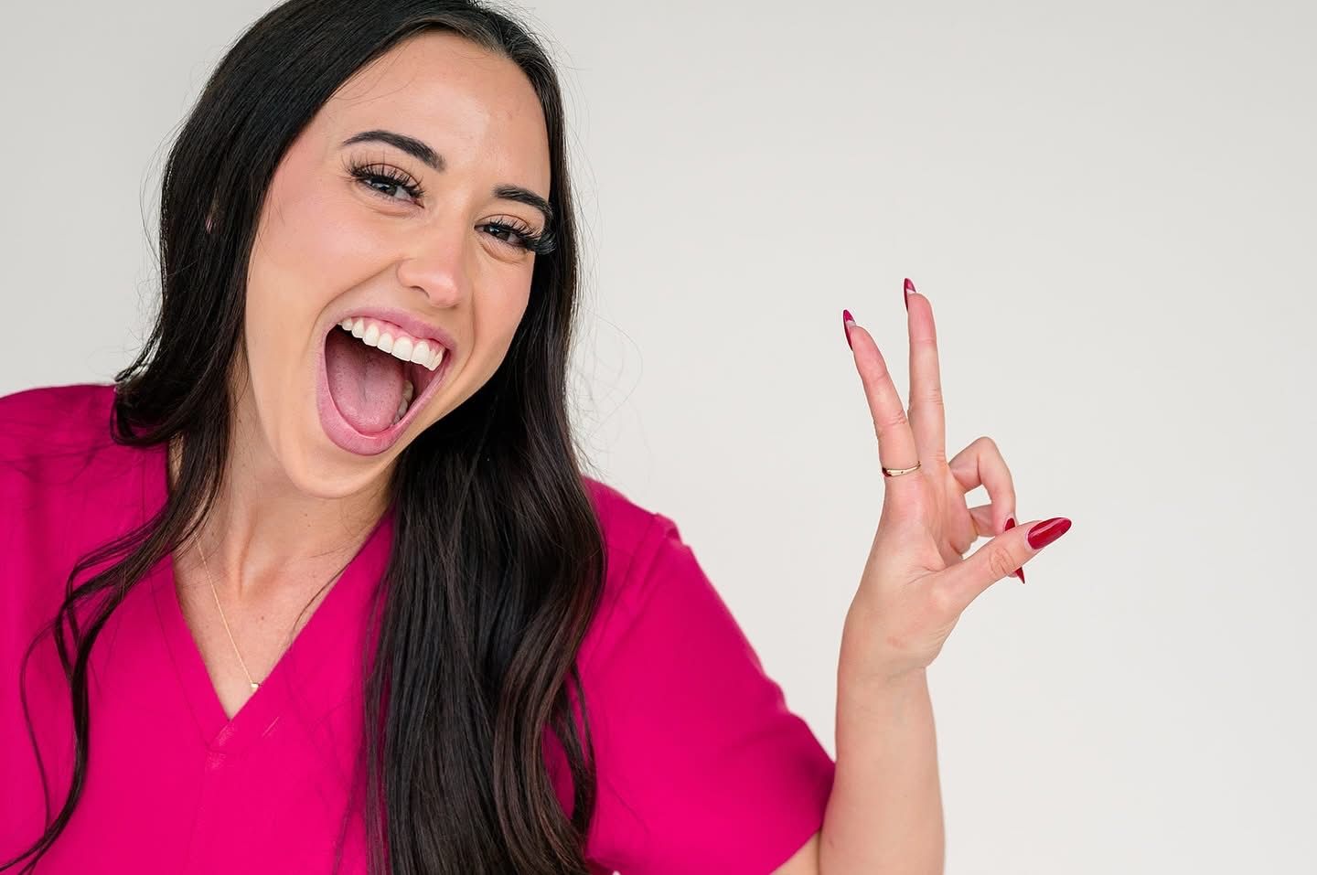 Joyful expressions shown in a series of four connected photos featuring bright pink clothing and energetic poses.