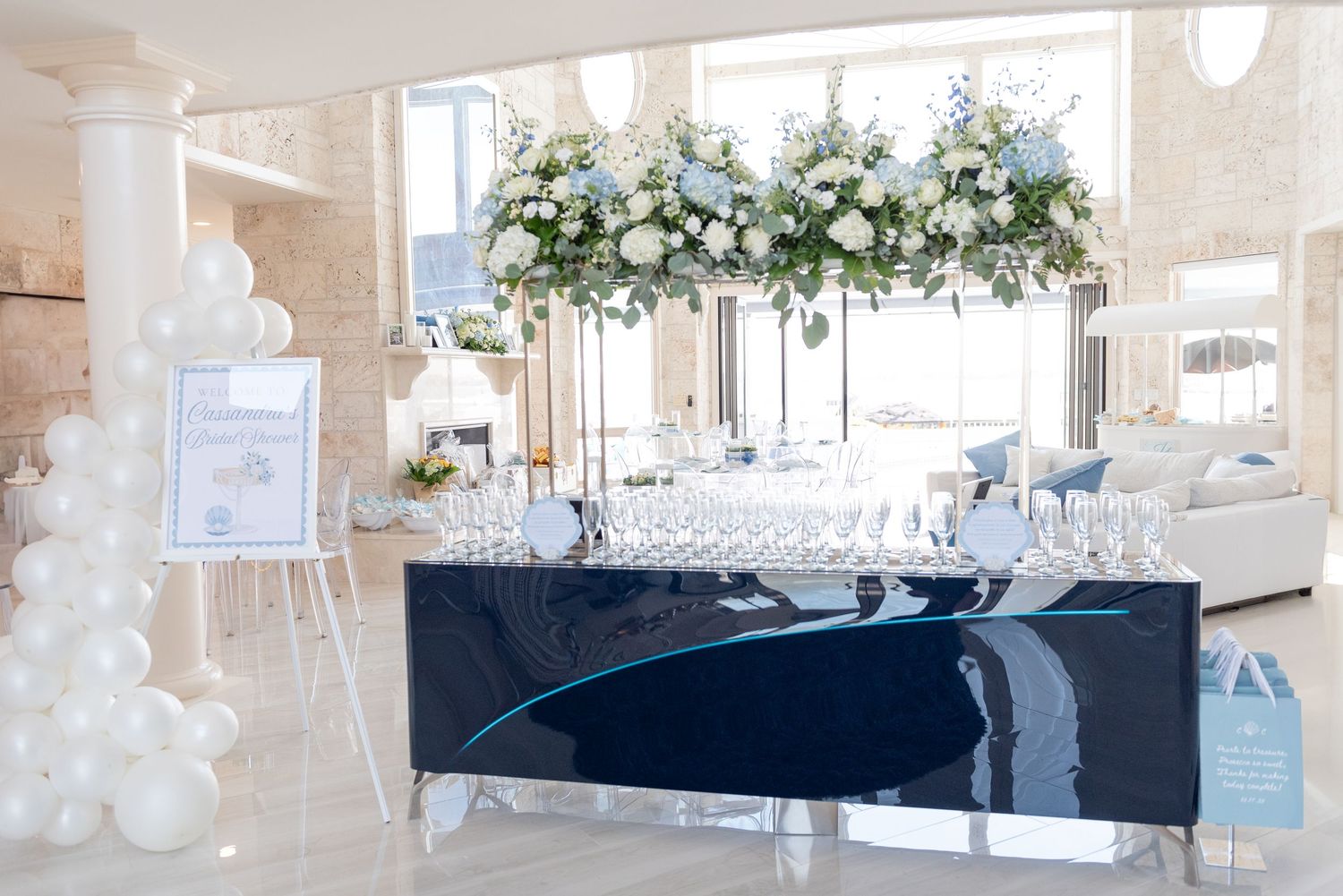 The entrance display at a bridal shower by the sea.