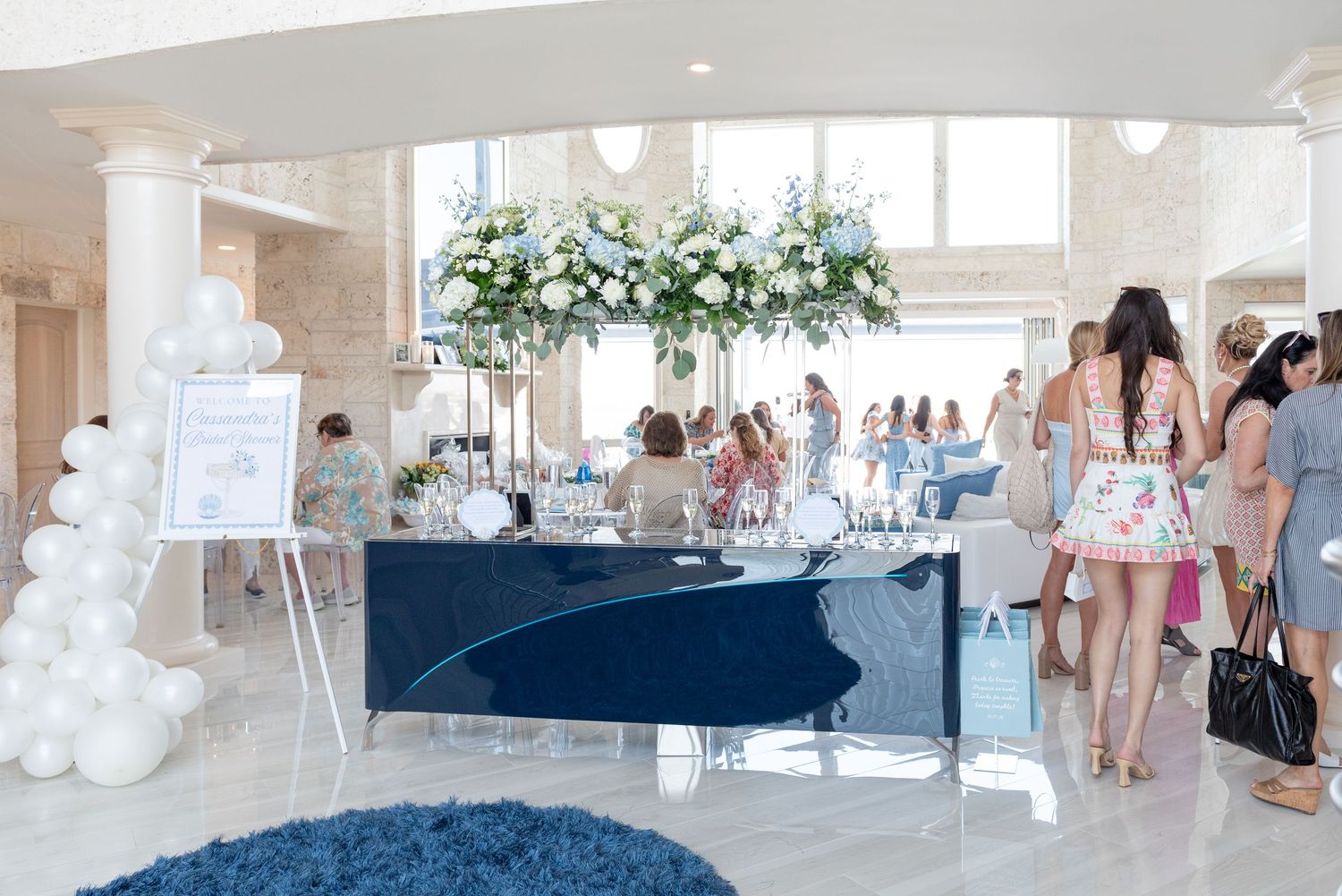 The entrance display at a bridal shower by the sea.