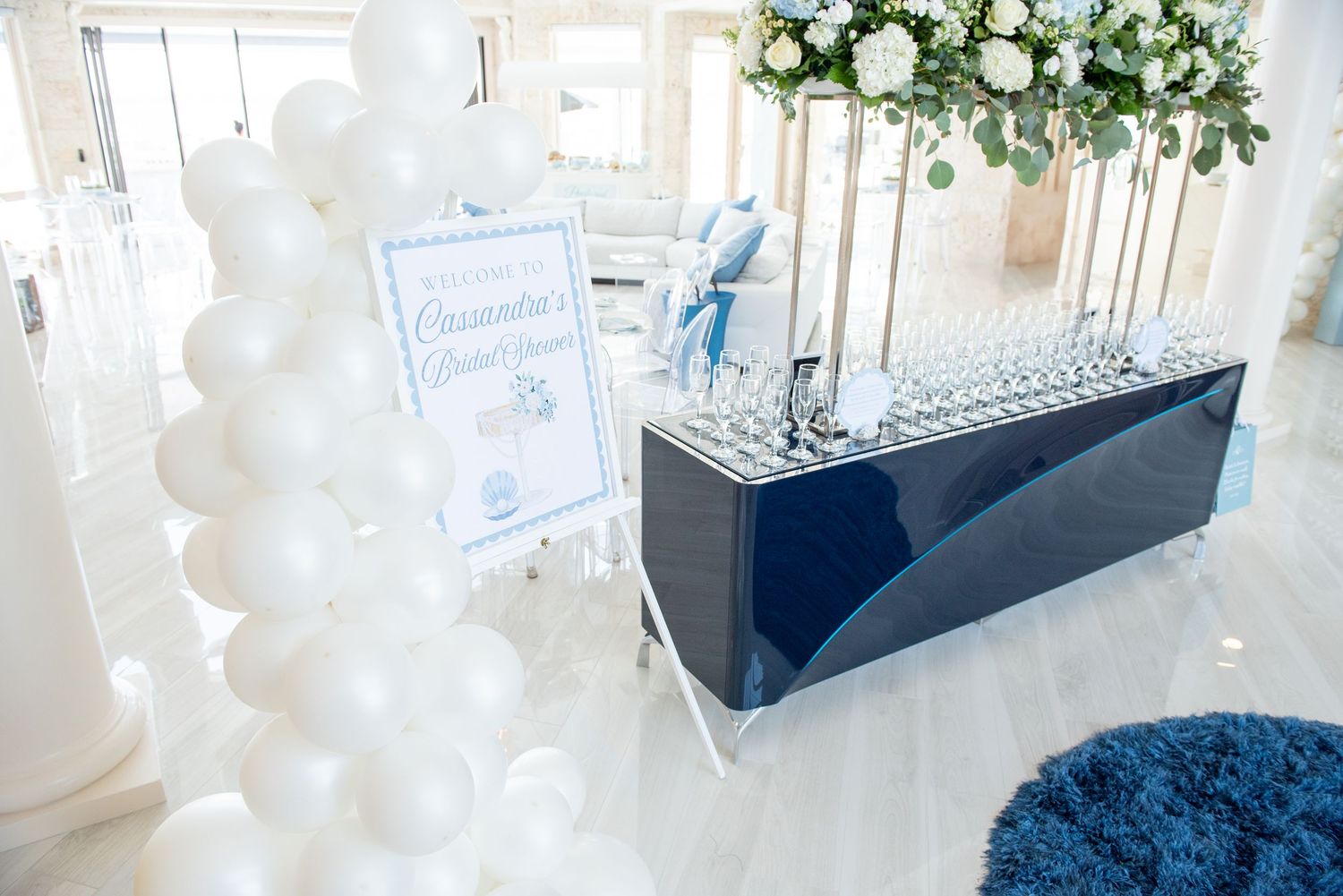 The entrance display at a bridal shower by the sea.