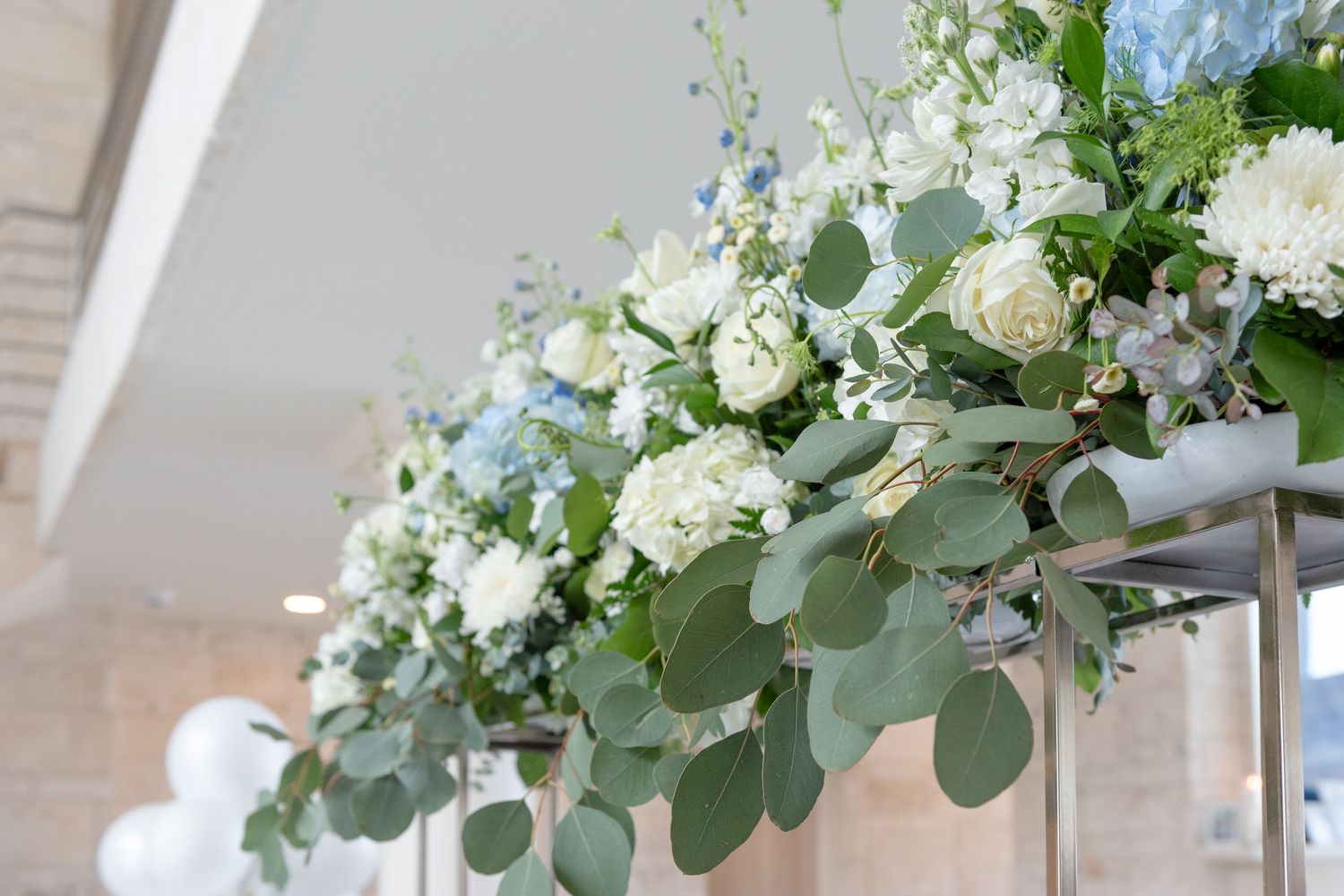 The entrance display at a bridal shower by the sea.