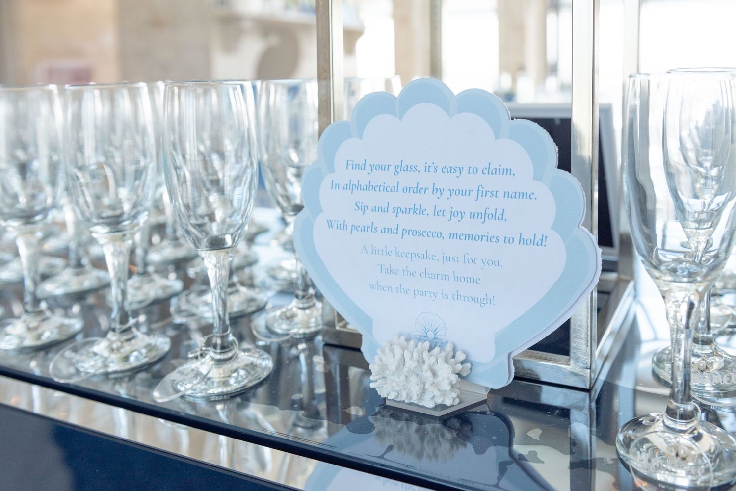 The entrance display at a bridal shower by the sea.