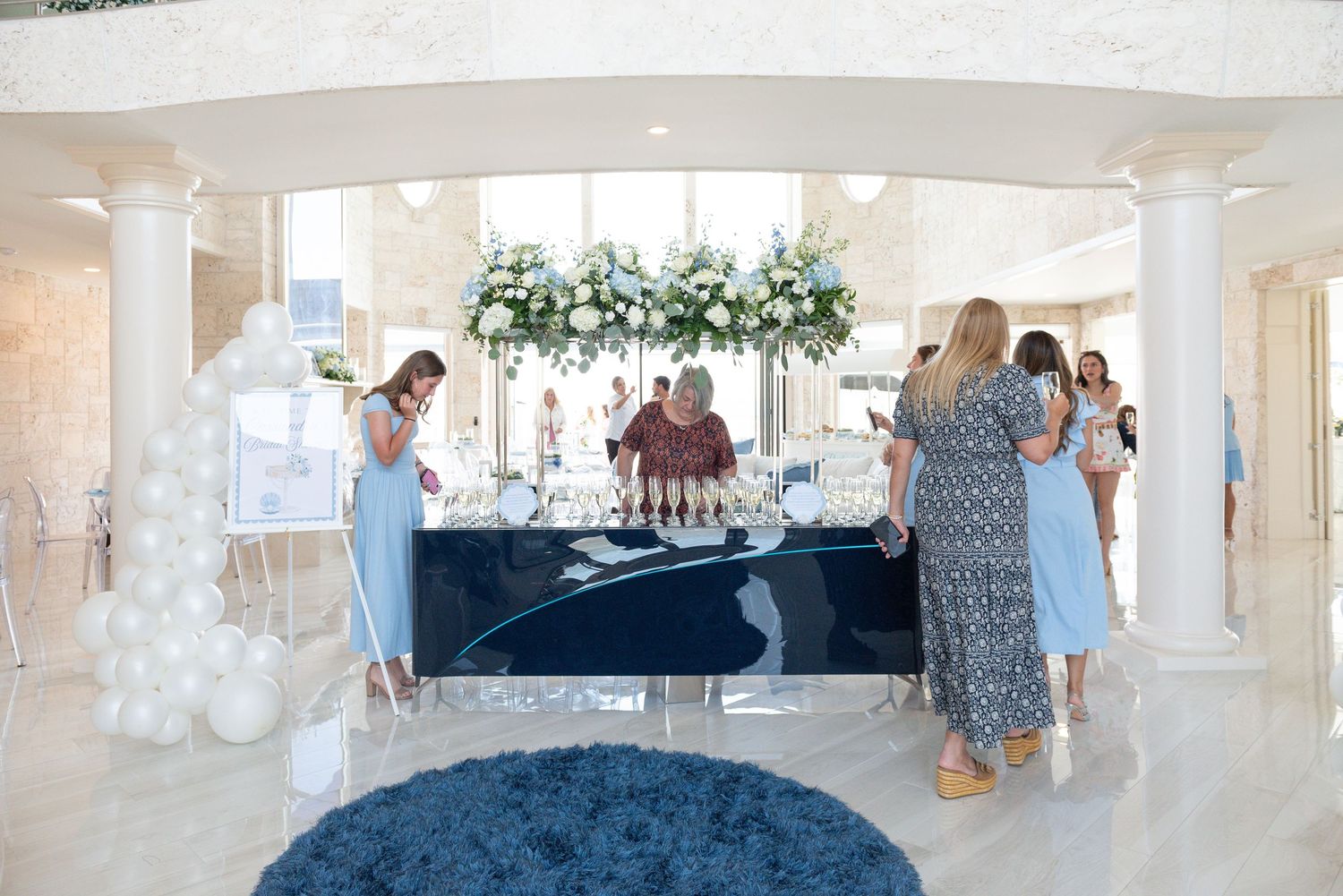 The entrance display at a bridal shower by the sea.