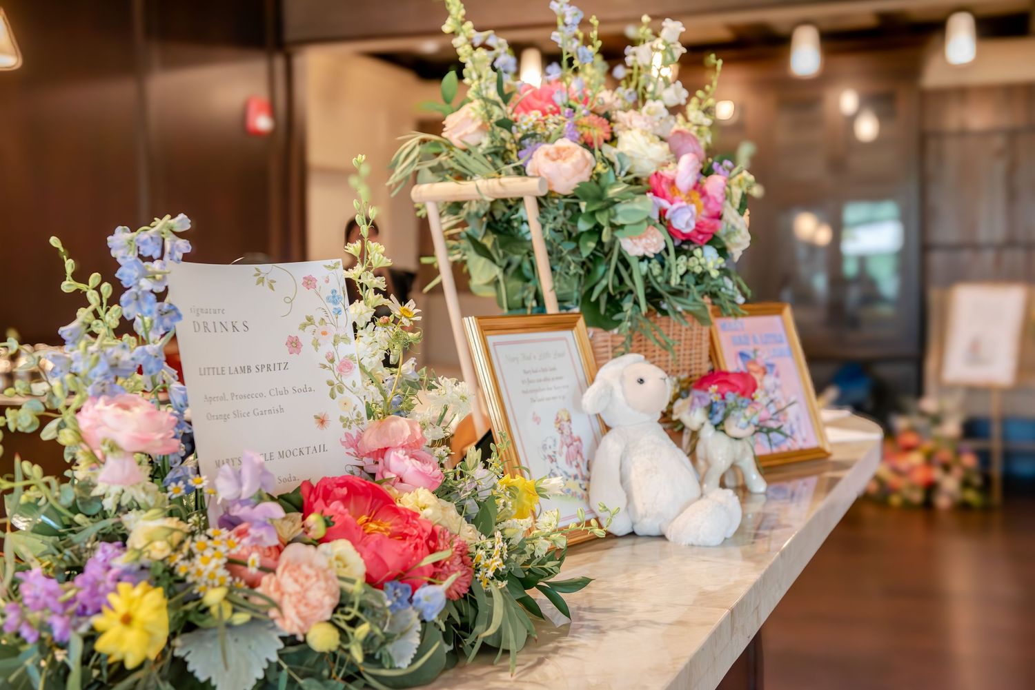 Florals and decor for our bar display at a baby shower.
