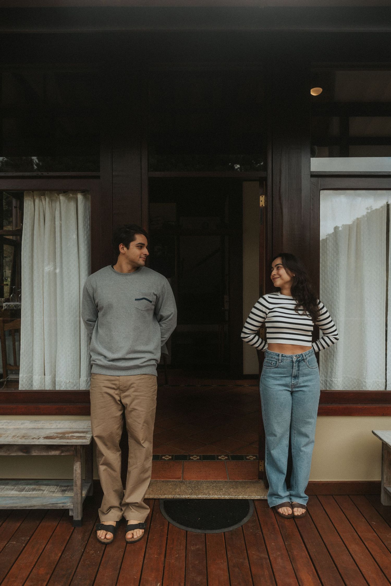 A couple in casual clothing stands together on a wooden deck in front of a window, shown in multiple cropped views.