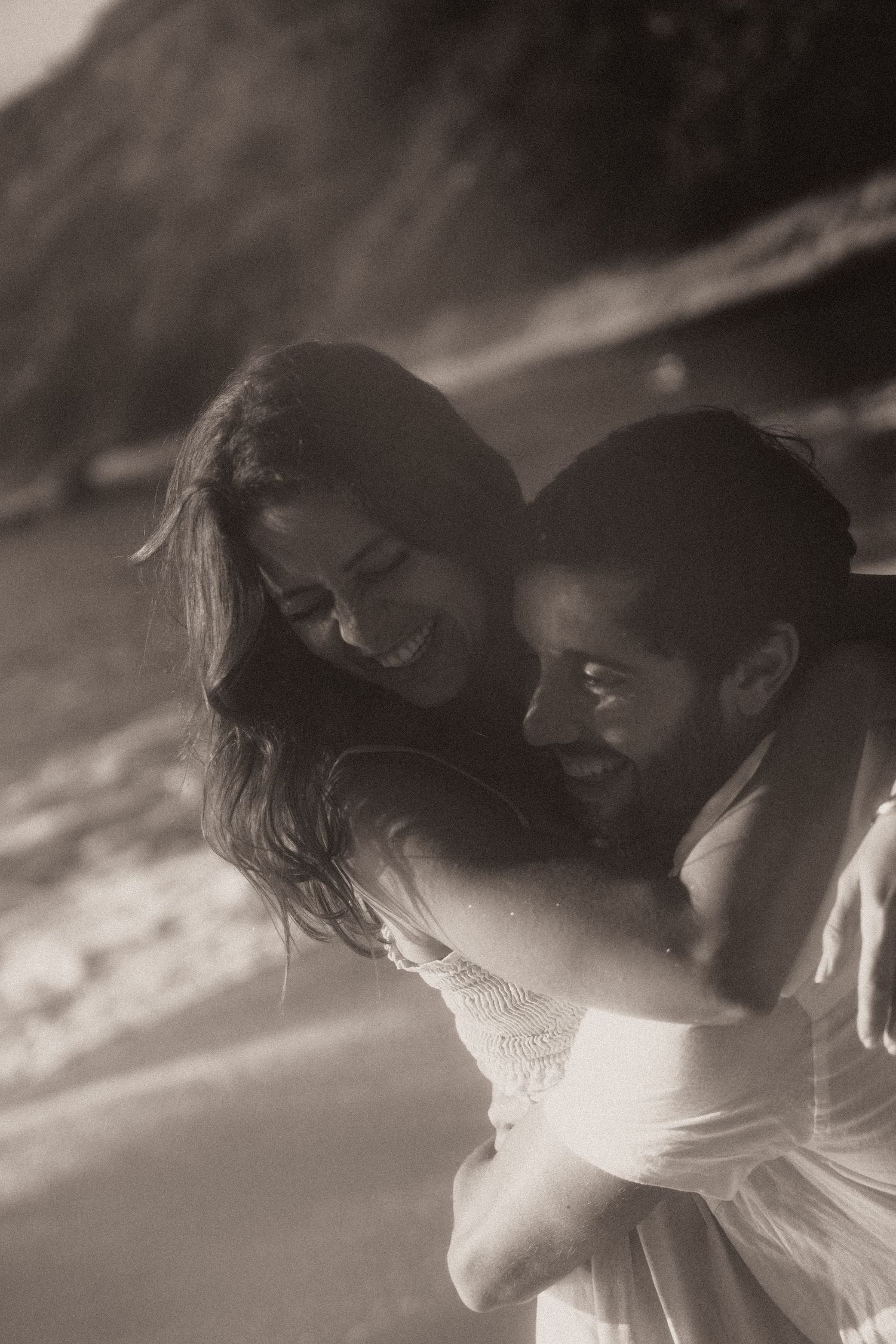 A romantic black and white wedding photo sequence shows a couple embracing and dancing together.