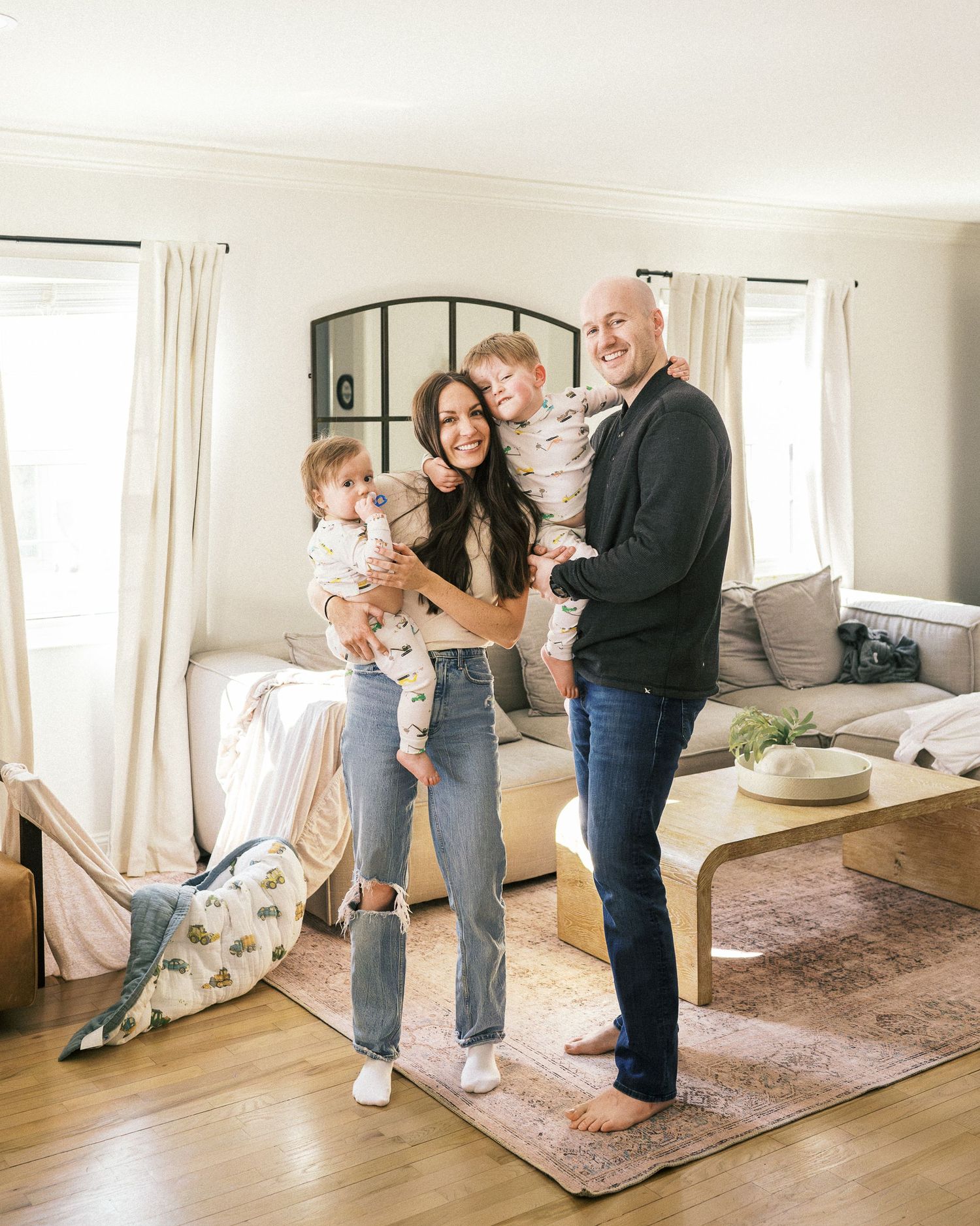 A series of loving family interactions photographed in a modern living room setting.