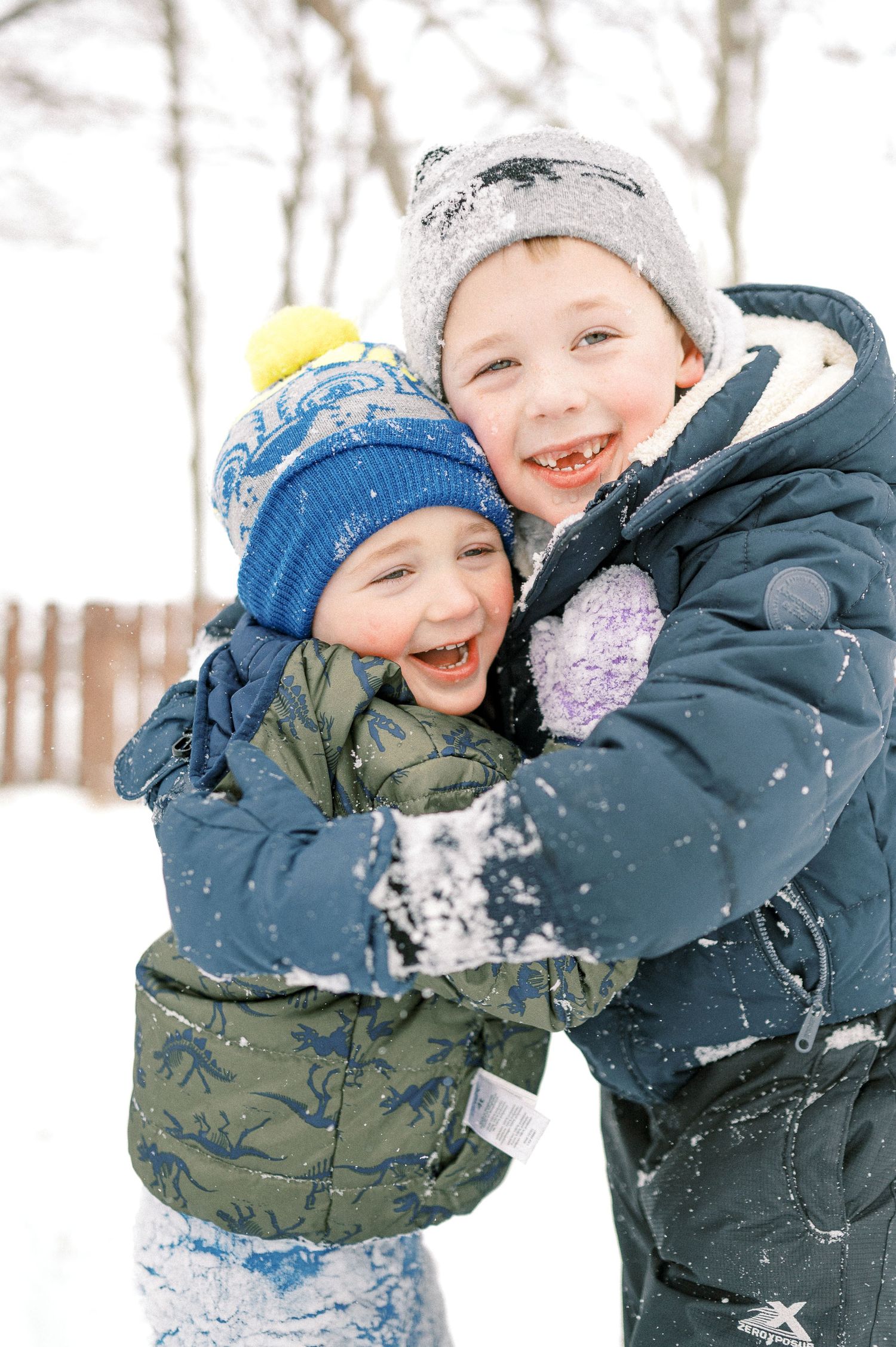 Two people playfully enjoying a winter day in the snow.