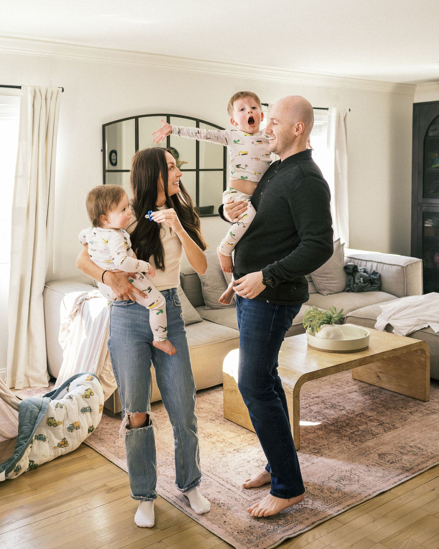 Fun family moments captured in sequence showing playful interactions on a pink area rug.
