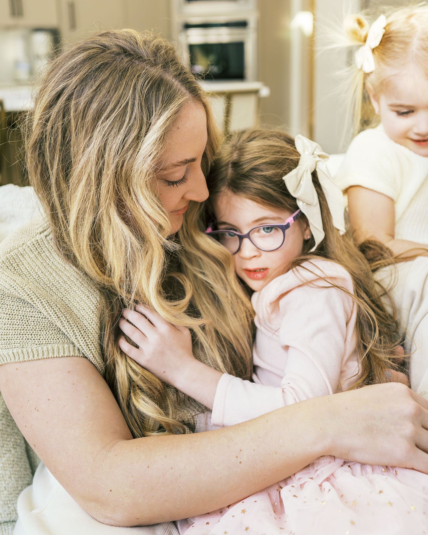 Intimate family portrait session showing genuine emotion and connection.
