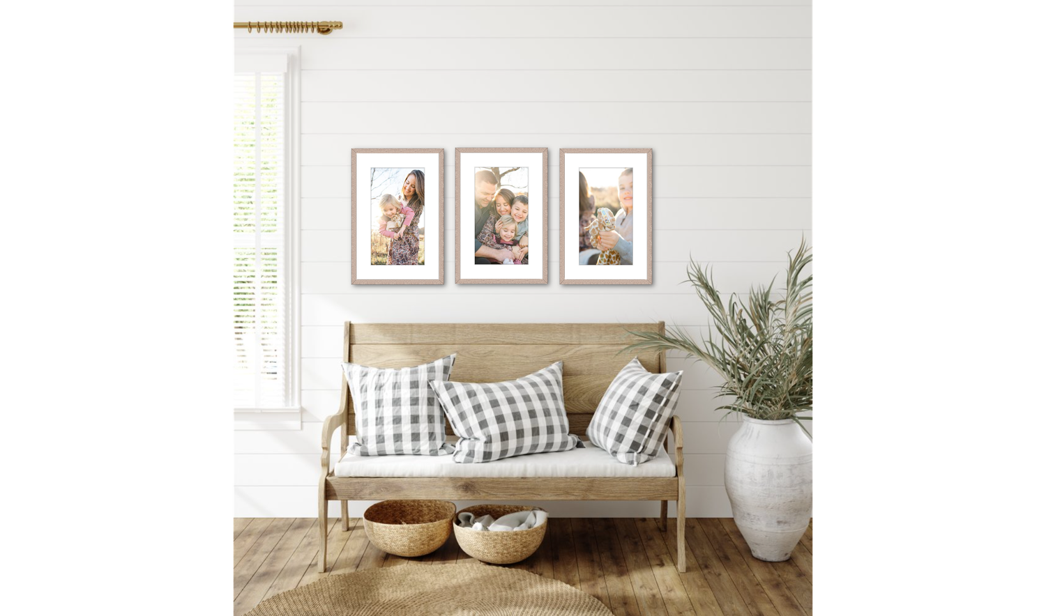 A minimalist home interior with neutral decor, plaid pillows, and natural accents.