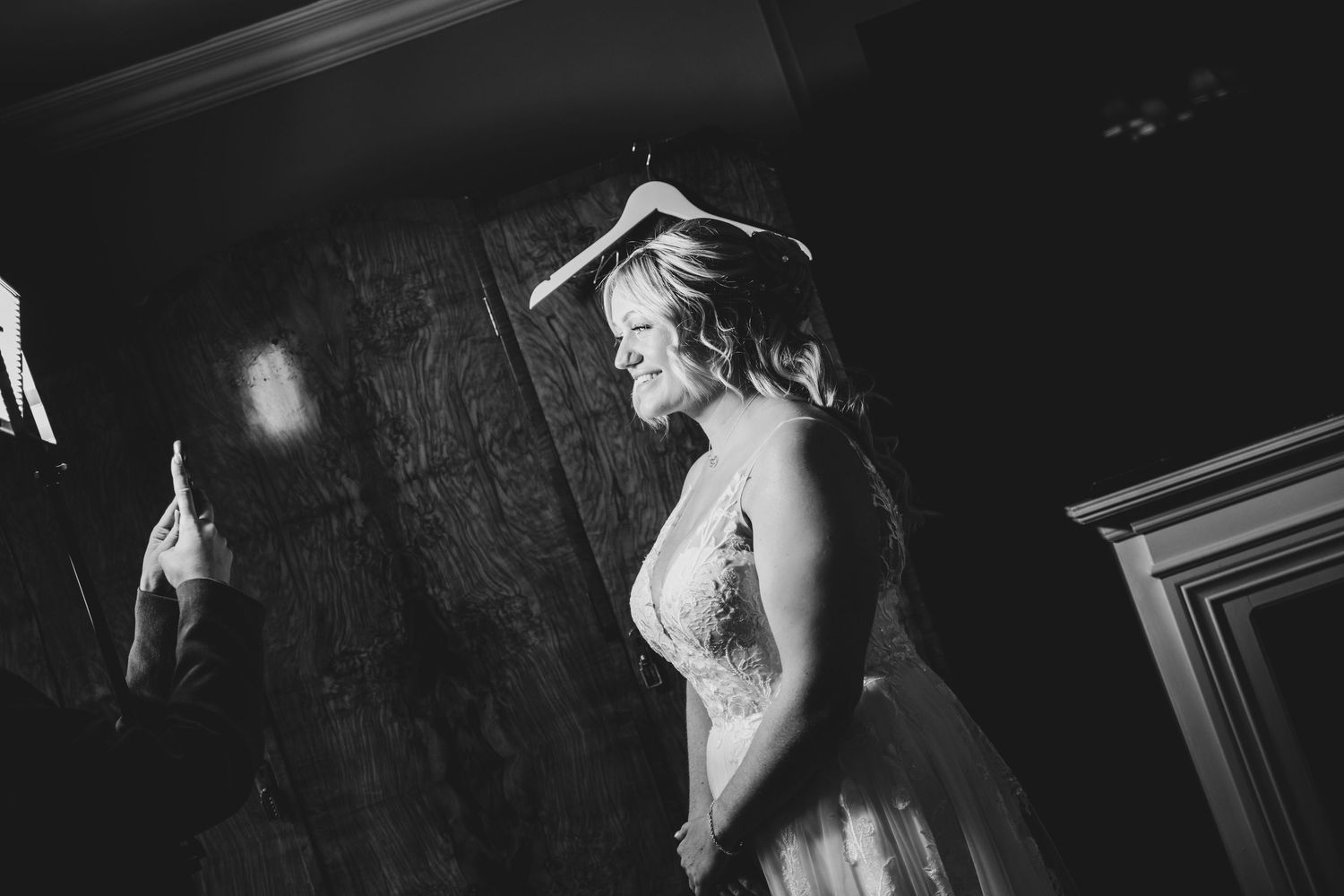 Dramatic black and white dance floor moments captured during wedding reception.
