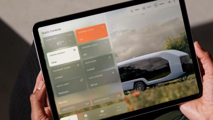 Hands holding a tablet displaying a smart vehicle control app interface with an electric bus in the background.