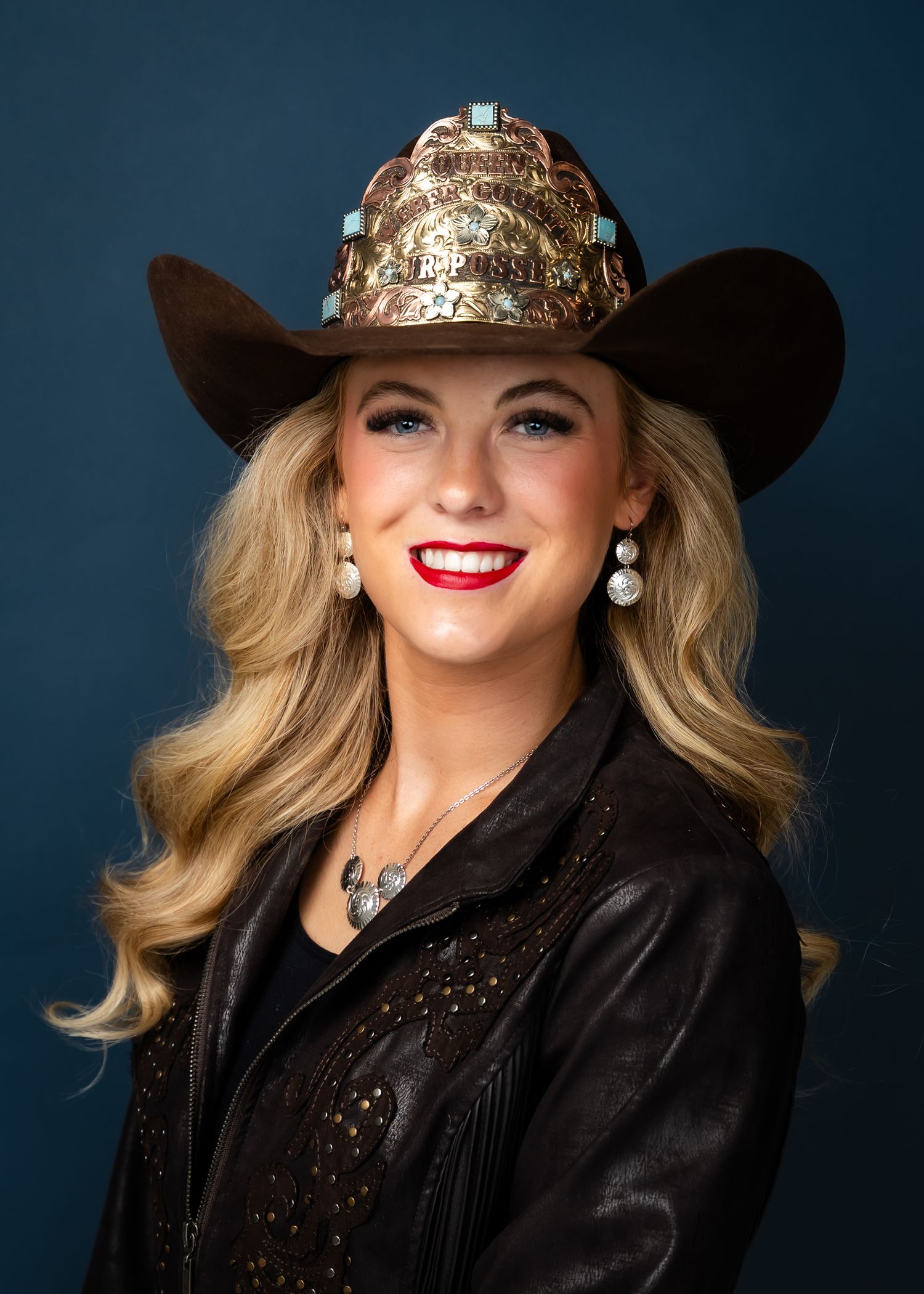 Rodeo Queen Headshot with cowboy hat and crown. The Monarch Studio #31  Northern Utah Photographer