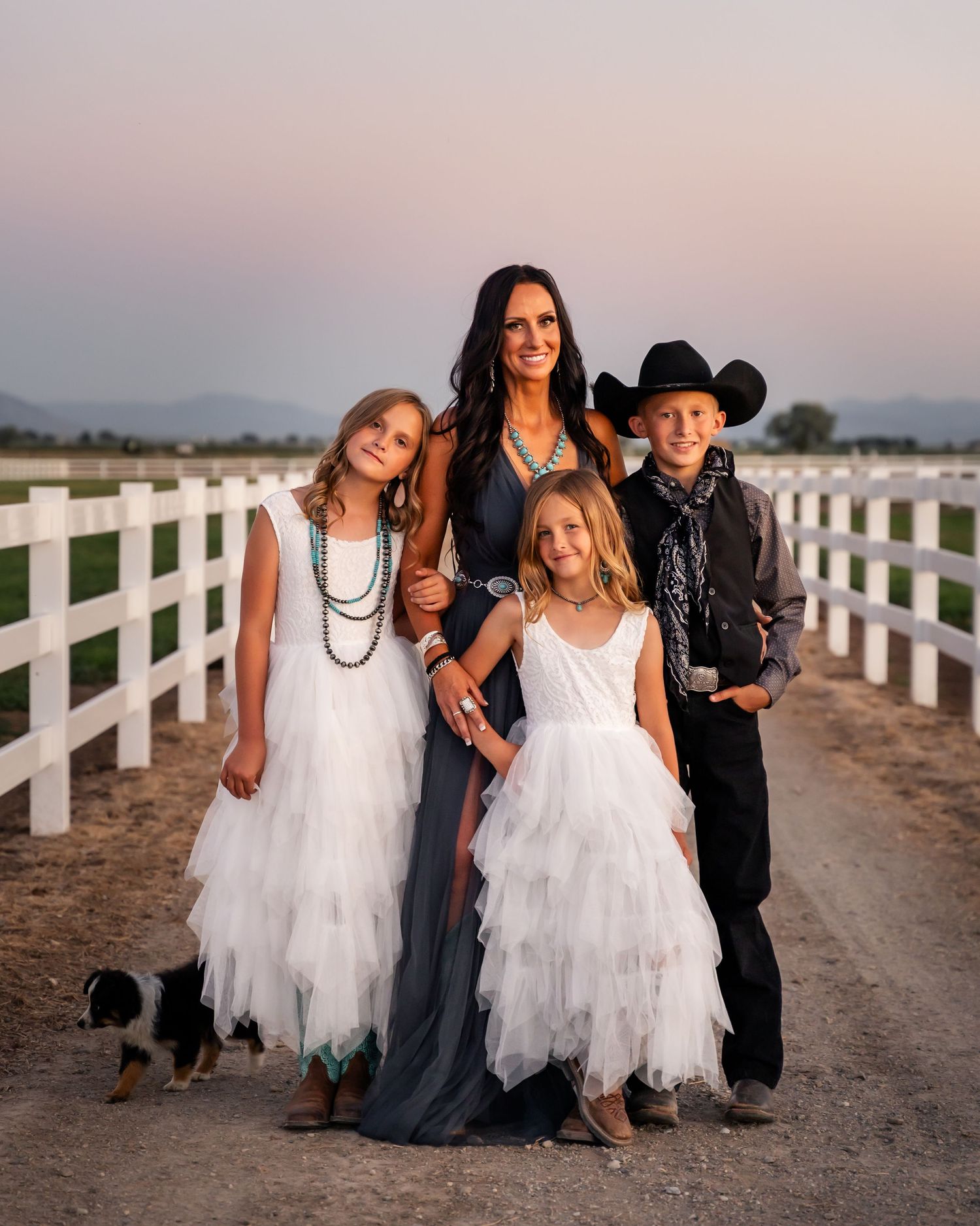 Family Session. Preston, Idaho with fall colors in a filed with horses.  Northern Utah Photographer