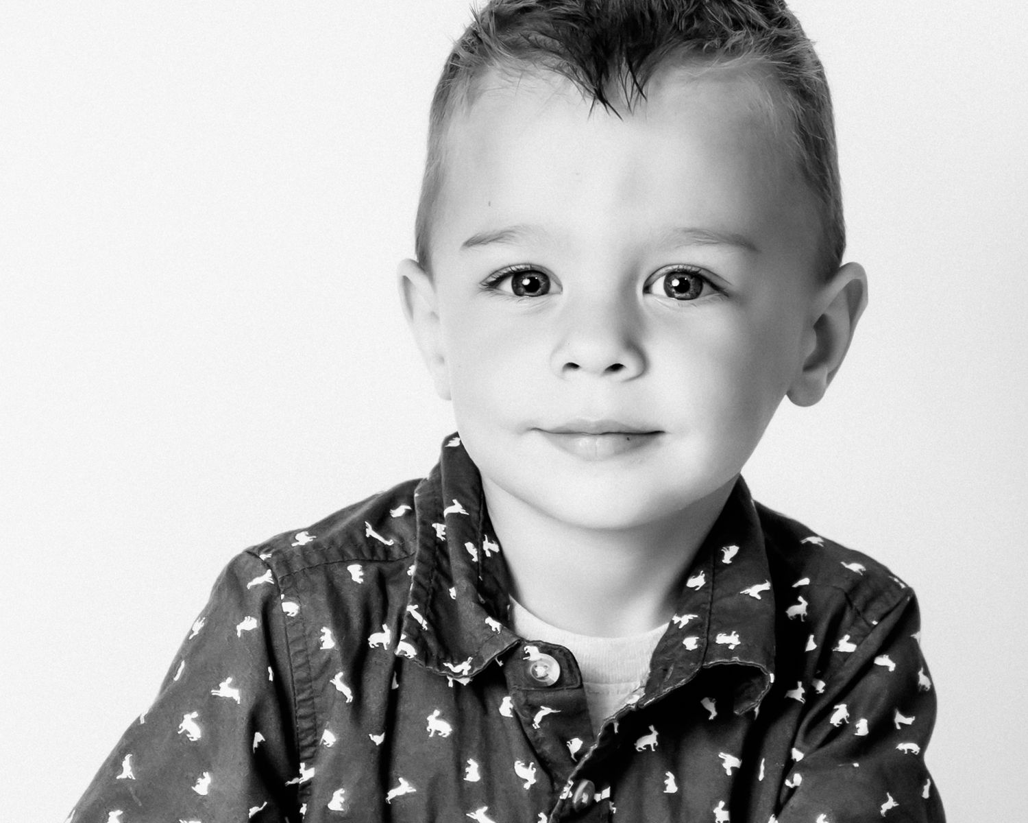 In Studio Session black and white of young boy in The Monarch, Ogden Utah. Northern Utah Photographer