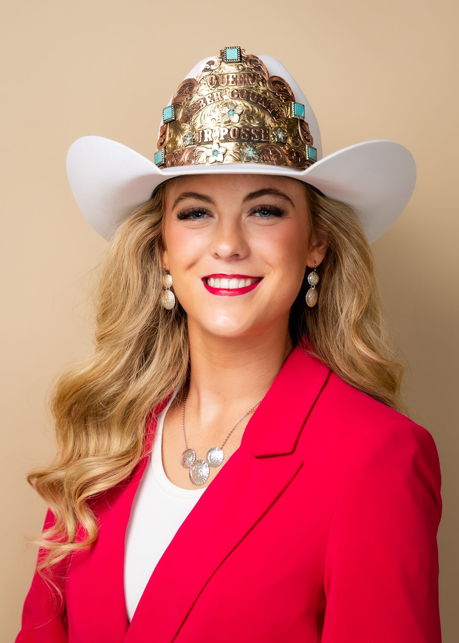 Rodeo Queen Headshot with cowboy hat and crown. The Monarch Studio #31 Northern Utah Photographer