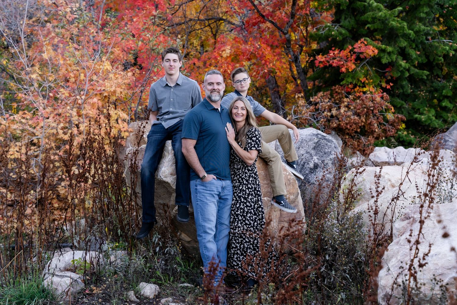 Family Session. Snow Basin, Utah with fall colors by large rocks.  Northern Utah Photographer