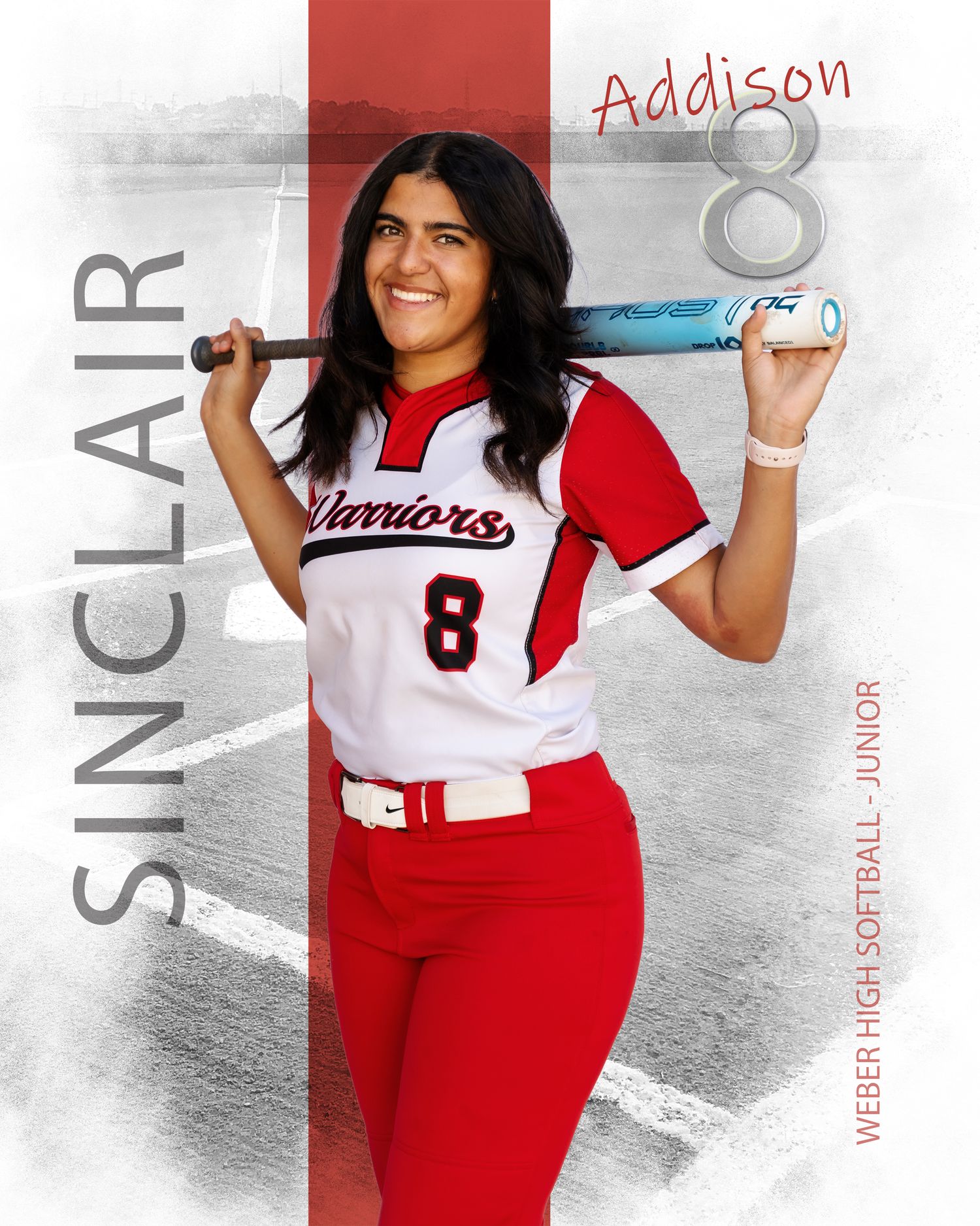 Addison Sinclair, Weber High Softball Junior, number 8, poses with a bat in her Warriors uniform.